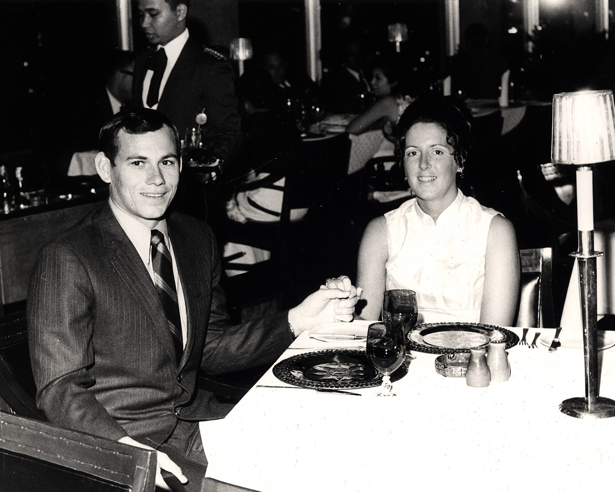 HANSCOM AIR FORCE BASE, Mass. - Capt. Pete Cleary and his wife Barbara enjoy a nice dinner at a restaurant in Manila, Philippines, spending time away from the rural atmosphere of the area near Clark Air Base, Philippines, in the northern region of the country on Luzon Island. (Courtesy photo)