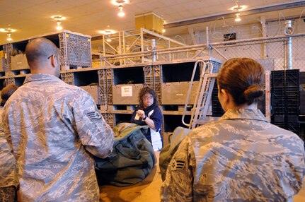 Kazia Hillary, Logistics Readiness Division, briefs personnel during mobility proccessing, prior to their upcomming deployment.  (U.S. Air Force photo by Rich McFadden)