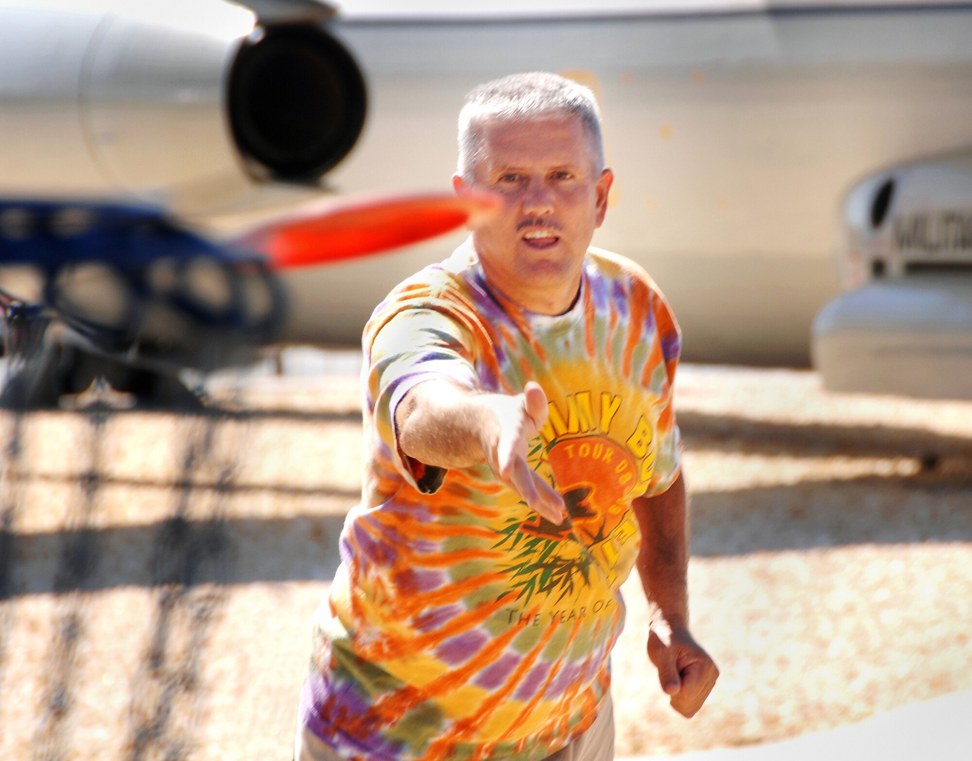 Tech. Sgt. Larry Kirk, 60th Security Forces Squadron augmentee, throws a frisbee during a recent game of disk golf. (U.S. Air Force photo/Amanda Lopez) 