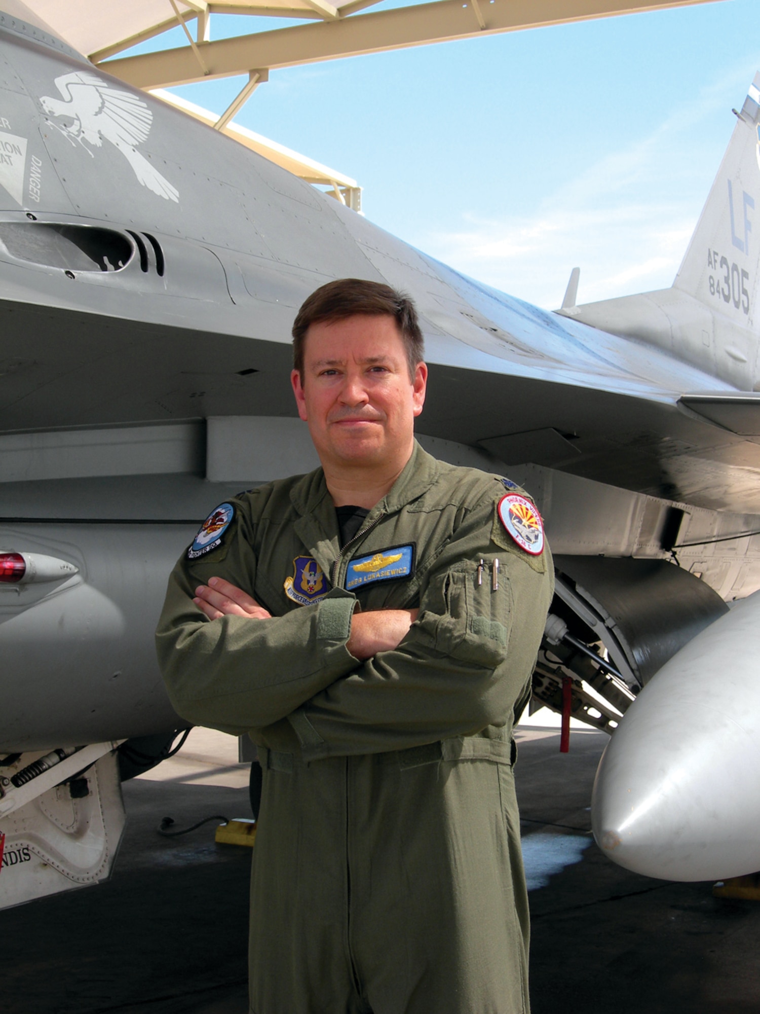 Lt. Col. Greg Lukasiewicz, 62nd Fighter Squadron assistant director of operations and 944th Fighter Wing, 301st Fighter Squadron Reservist pilot, broke 4,000 F-16 flying hours after 20 years of piloting the F-16 jet. (U.S. Air Force photo/Senior Airman Tong Duong)