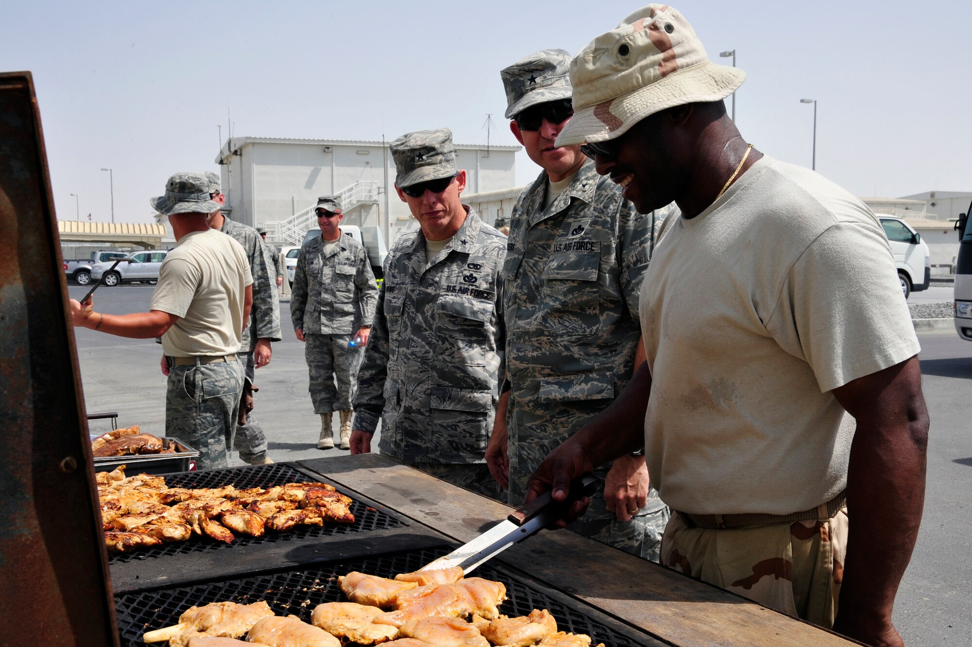 SOUTHWEST ASIA - Maj. Gen (Select) Timothy Byers, the Air Force Engineer, speaks to Master Sgt. Darryl Harris 380th Expeditionary Civil Engineer Squadron Sept. 20, 2009. General Byers is stationed at the Air Force Headquarters, Washington D.C., Sergeant Harris is Deployed from Spangdahlem Air Base, Germany, and is the non-commissioned officer in charge of electrical systems. (U.S. Air Force photo/Tech. Sgt. Charles Larkin Sr)