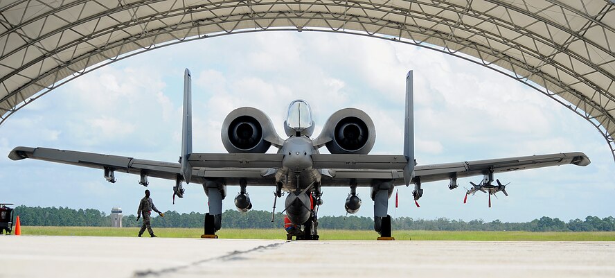 MOODY AIR FORCE BASE, Ga. -- Members of the Air Combat Command Inspector General Team from Langley Air Force Base, Va., examine an A-10C Thunderbolt II during the Phase I Operational Readiness Inspection here Sept 21. During the inspection, the wing is tested on its ability for rapid deployment of personnel, equipment and assets. (U.S. Air Force photo by Airman 1st Class Joshua Green)