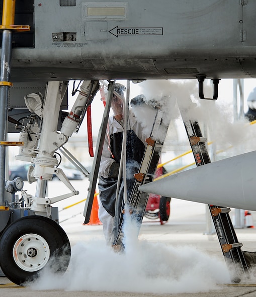MOODY AIR FORCE BASE, Ga. -- Airman 1st Class Norman LeDoux, 23rd Aircraft Maintenance Squadron crew chief, inputs liquid oxygen into an A-10C Thunderbolt II during the Phase I Operational Readiness Inspection here Sept 21. (U.S. Air Force photo by Airman 1st Class Joshua Green)