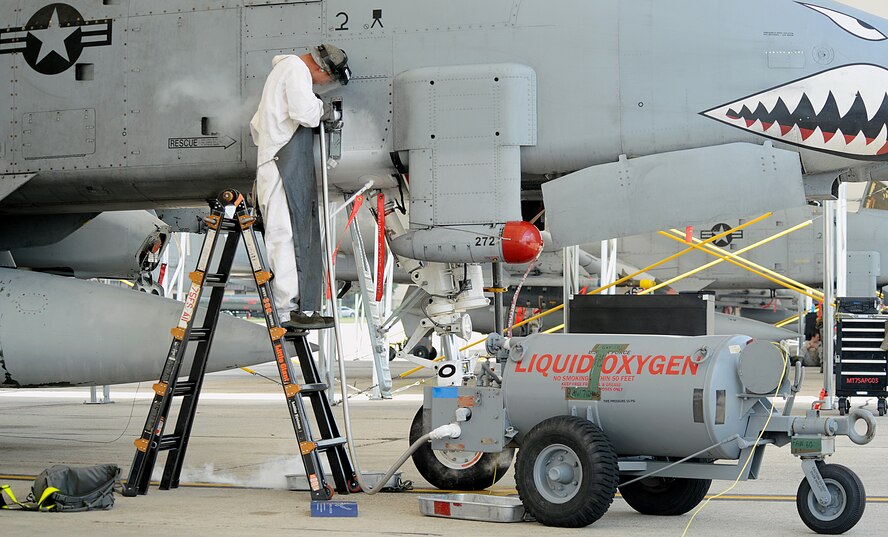 MOODY AIR FORCE BASE, Ga. -- Airman 1st Class Norman LeDoux, 23rd Aircraft Maintenance Squadron crew chief, inputs liquid oxygen into an A-10C Thunderbolt II during the Phase I Operational Readiness Inspection here Sept 21. This allows the pilot to breathe supplemental oxygen at high altitudes to help prevent hypoxia and the effects associated with it. (U.S. Air Force photo by Airman 1st Class Joshua Green)