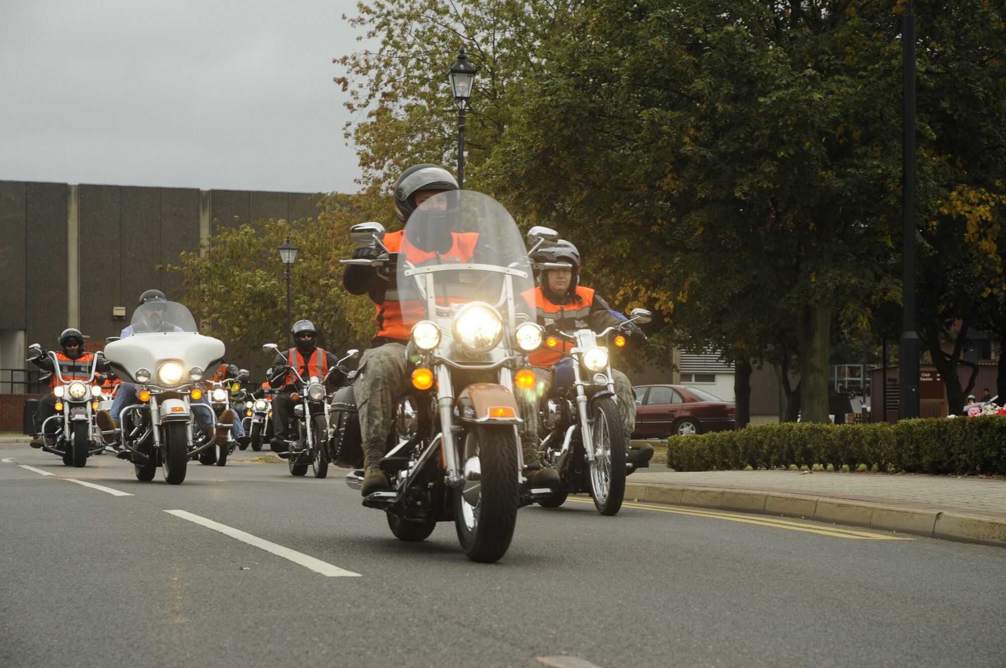 Motorcycle riders drive down the road on RAF Mildenhall in honor of POW/MIA Week on Sept. 15, 2009, at RAF Lakenheath, England. More than 50 riders gathered together to pay tribute to those who have made the ultimate sacrifice for their country. (U.S. Air Force photo/ Airman 1st Class Eboni Knox) 