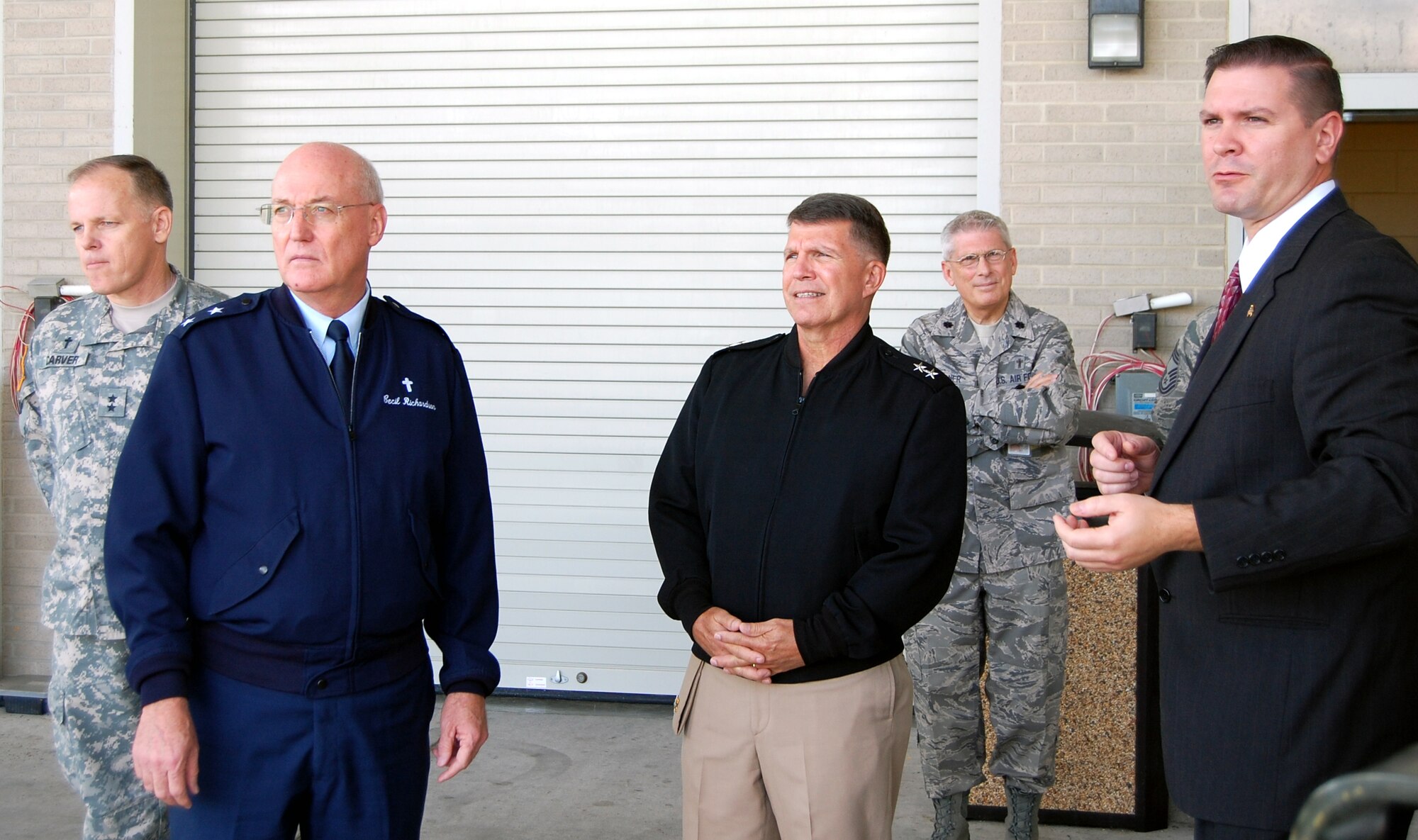 Mr. Randy Keel Director, Port Mortuary, Air Force Mortuary Affairs Operation Center briefs Chaplain (Rear Adm.) Robert Burt, U.S. Navy, Chaplain (Maj. Gen.) Cecil Richardson, U.S. Air Force, and Chaplain (Maj. Gen.) Douglas Carver, U.S. Army as Chaplain (Lt. Col.) Timothy Wagoner looks on about current missions at AFMAO U.S. Air Force photo by 1st Lt. Joseph Winter (Released)