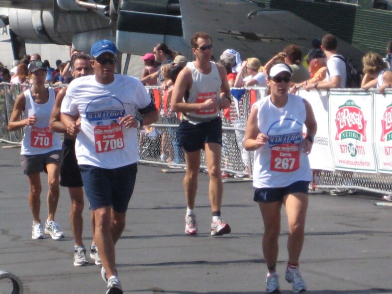 SEYMOUR JOHNSON AIR FORCE BASE, N.C. -- Lt. Col. Art Primas and Tech. Sgt. Carrie Baker, 911th Air Refueling Squadron, complete the Air Force Marathon on Sept. 12, 2009.