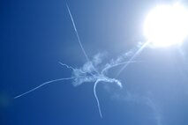 HICKAM AIR FORCE BASE, Hawaii -- The Thunderbirds, U.S. Air Force Demonstration Squadron, perform over Hickam Air Force Base, Hawaii, during the "Wings Over the Pacific," Open House Sept. 19 before a crowd of more than 42,000. The Thunderbirds demonstrate the capabilities the F-16 Fighting Falcon by performing combat maneuvers during their aerial demonstration. This is Hickam's first open house since 2003, and a crowd of nearly 100,000 paid a visit during the weekend. (U.S. Air Force photo/Staff Sgt. Mike Meares)