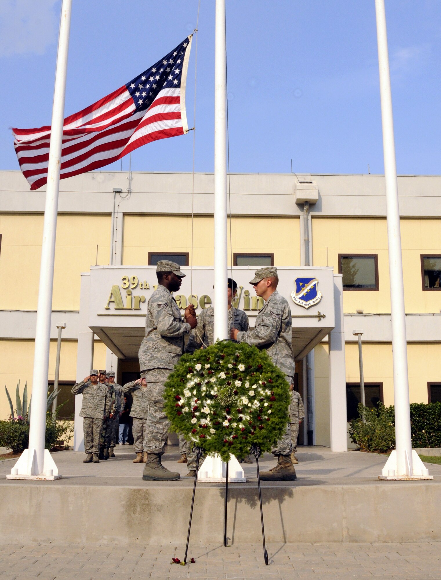 (From left to right) Senior Airman Christopher Craig, Senior Airman Nikki Brisco and Senior Airman Joseph Hall, Airman Leadership School students, perform the flag detail Friday, Sept. 18, 2009 during the POW/MIA Recognition Day ceremony at Incirlik Air Base, Turkey. POW/MIA Recognition Day is observed on the third Friday in September, this year being the same day as the U.S. Air Force’s 62nd birthday. This day helps the nation remember those imprisoned while serving in conflict and those who remain missing in action. (U.S. Air Force photo/Airman 1st Class Amber Ashcraft)