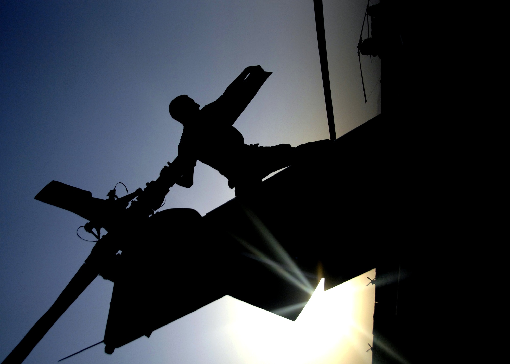 KANDAHAR AIRFIELD, Afghanistan -- Senior Airman Joshua Marcantel checks the rear blades of an HH-60 Pave Hawk during a pre-flight inspection here, Sept. 21, 2009. Pre-flight inspections must be performed every seventy-two-hours to be qualified for flight. Airman Marcantel is an HH-60 Crew Chief with the 55th Expeditionary Helicopter Maintenance Unit from Davis-Monthan Air Force Base, Tucson, Ariz. and hails from Elkins, W.V. (U.S. Air Force photo/Senior Airman Timothy Taylor)