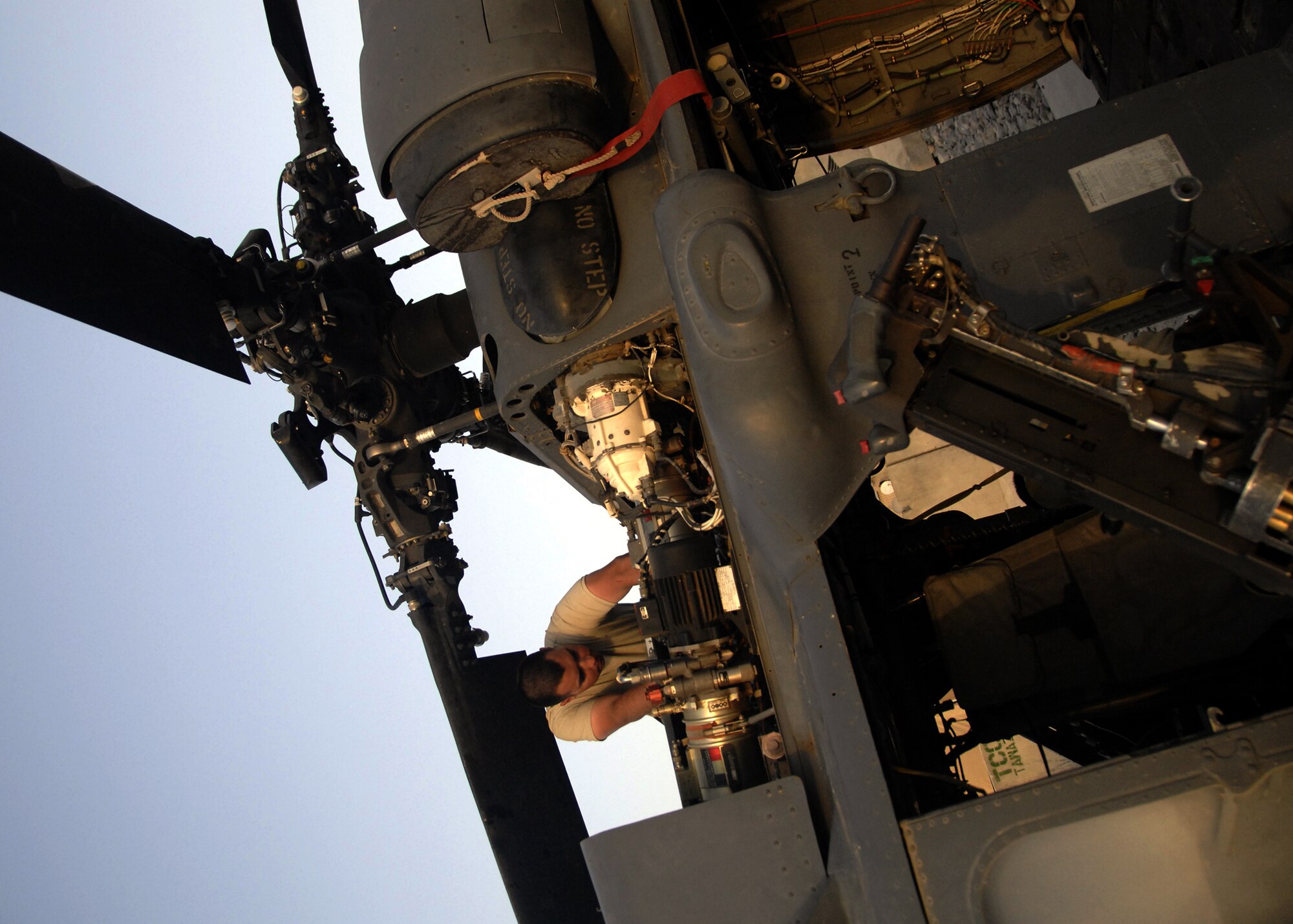 Senior Airman Shane Garza inspects different components during a pre-flight inspection of an HH-60 Pave Hawk here, Sept. 21, 2009. Pre-flight inspections must be performed every 72 hours to be qualified for flight. Airman Garza is a crew cheif with the 55th Expeditionary Helicopter Maintenance Unit from Davis-Monthan Air Force Base, Ariz. and hails from Grapevine, Texas. (U.S. Air Force photo/Senior Airman Timothy Taylor)