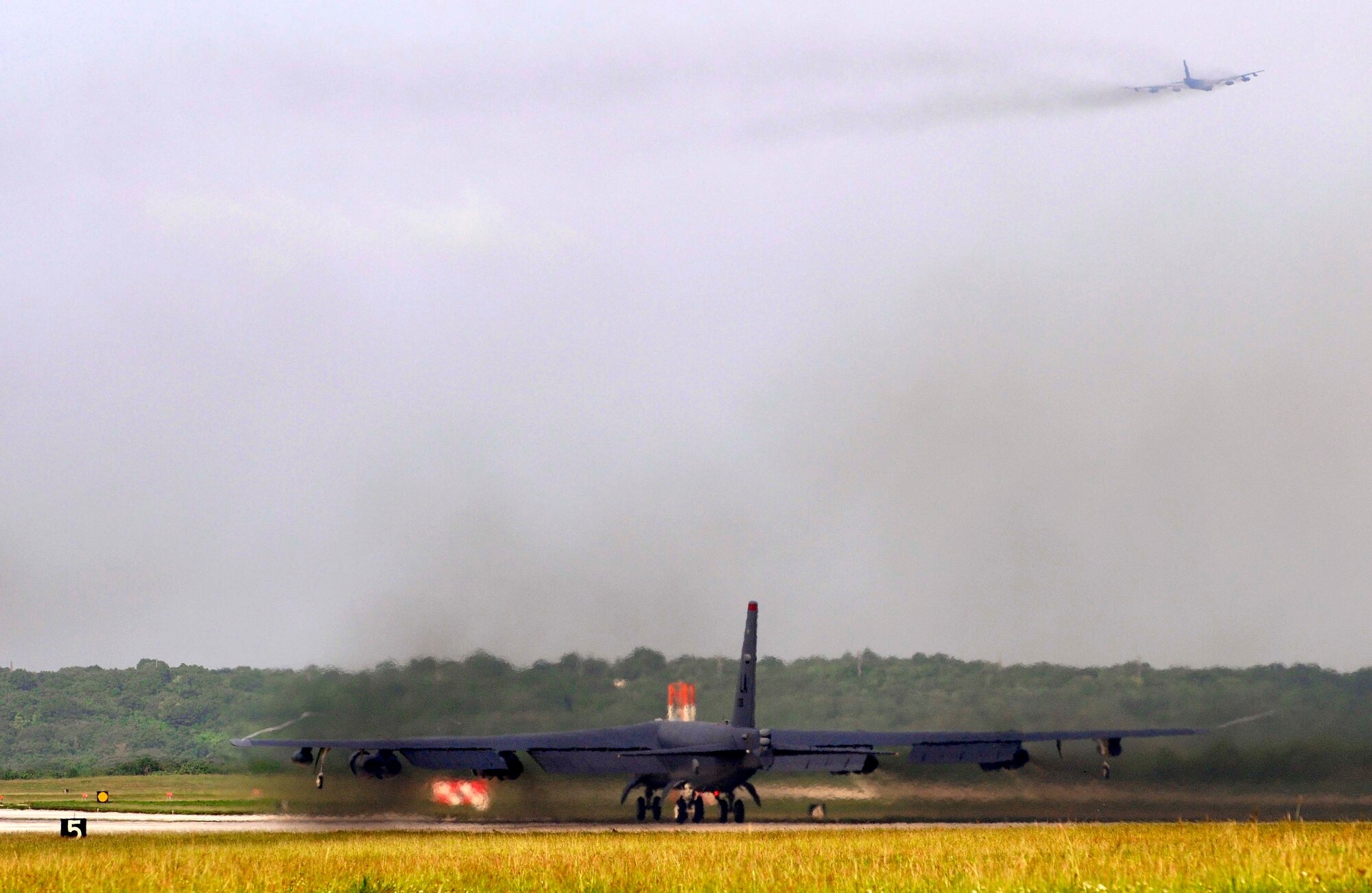 A B-52 Stratofortress from the 96th Expeditionary Bomb Squadron taxis down the Andersen Air Force Base, Guam, runway to participate in a Green Lightning exercise Sept. 21. The B-52 flew to an Australian training range where the aircrew coordinated a simulated strike with Australian joint terminal attack controllers. (U.S. Air Force photo/Airman 1st Class Courtney Witt)