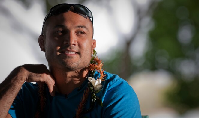 HICKAM AIR FORCE BASE, Hawaii -- Ultimate Fighting Champion, lightweight category, BJ Penn visits 50 U.S. Army and Marine Corps Wounded Warriors on the lanai here Sept. 18. Penn's two-day visit to Hickam AFB also included an orientation flight in a Thunderbirds F-16 Falcon in conjunction with the 2009 Open House. The event drew more than 99,000 people. (U.S. Marine Corps photo by Sgt. Mark A. Fayloga)