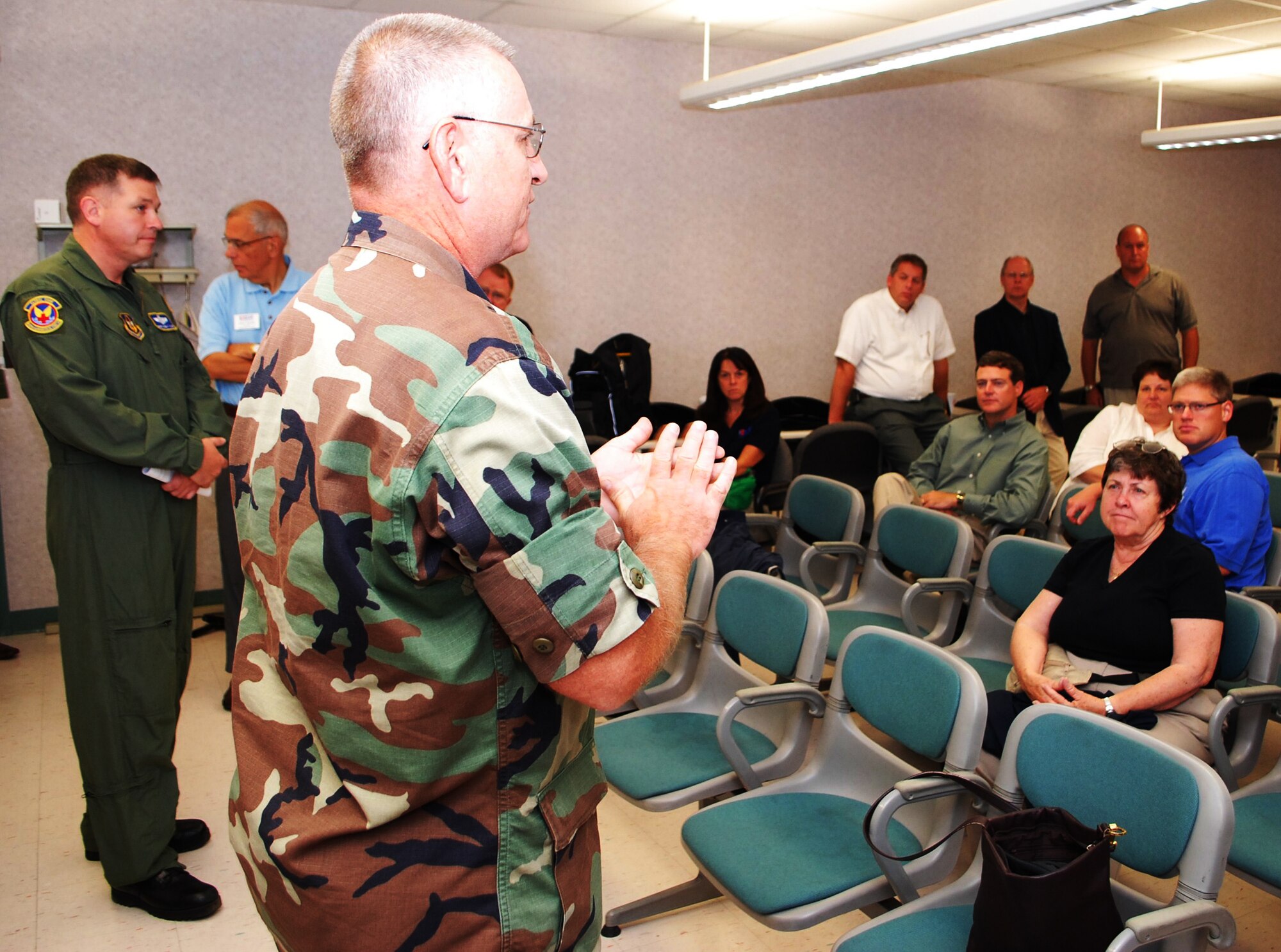 AES BRIEF ? Lt. Col. David Zamorski, right, and Senior Master Sgt. Wayne Allen, 439th Aeromedical Evacuation Squadron, explain their unit?s mission to more than 40 employers of guardsmen and reservists Sept. 23 at Westover. The briefing was part of an Employer Support for the Guard and Reserve (ESGR) Bosslift flight taking the Massachusetts and Connecticut employers aboard a Westover C-5 to Lackland Air Force Base, Texas,  a tour of the 433rd Airlift Wing?s flight line and some of the medical facilities there. (US Air Force photo/Tech. Sgt. Andrew Biscoe) 