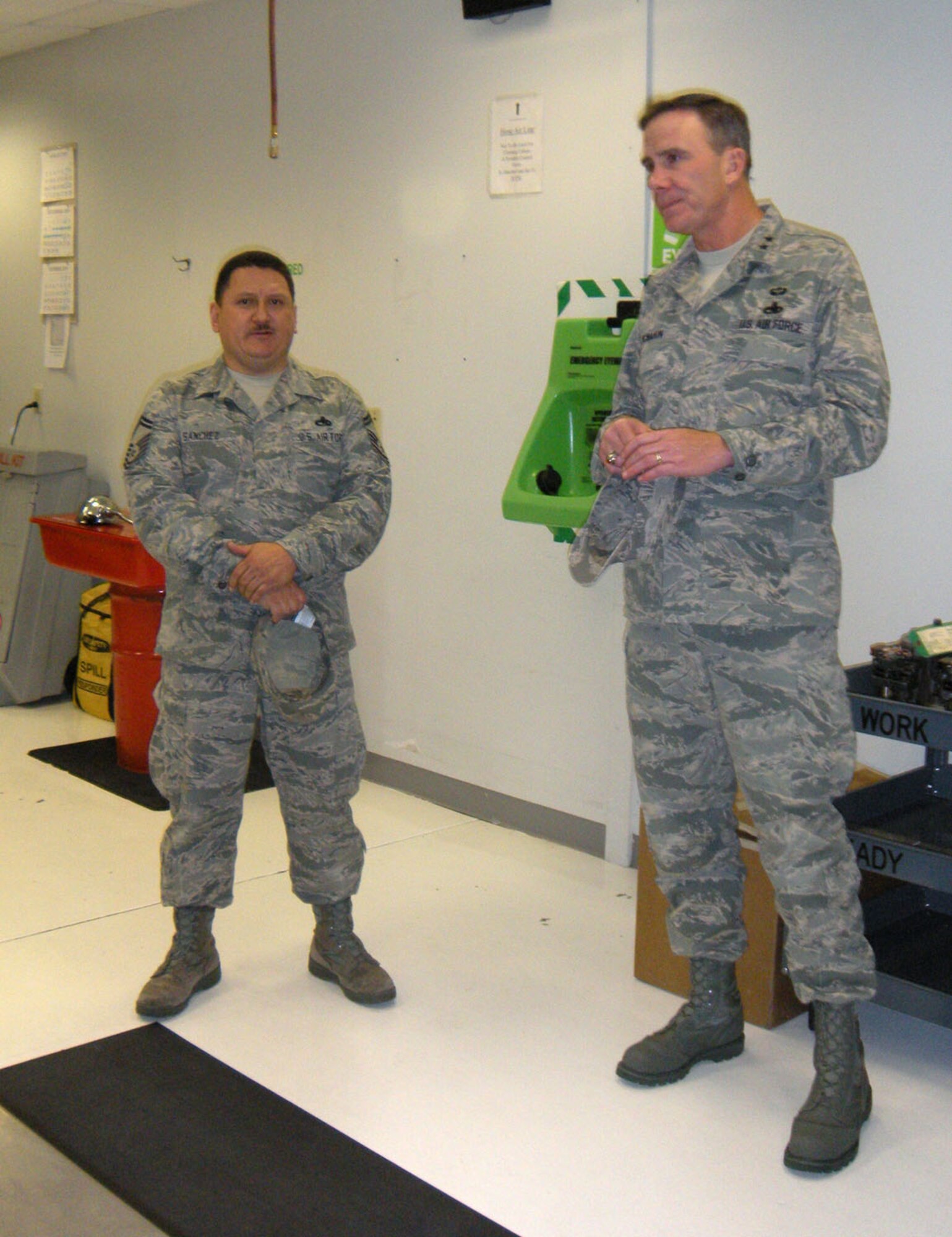 Maj. Gen. Robert H. McMahon discusses Total Force Initiative plans with Senior Master Sgt. Freddie Sanchez and other members of the 302nd Maintenance Group Sept. 24 at Peterson Air Force Base, Colo. The general learned about the progress of integrating an Active Duty and Air Force Reserve C-130 airlift wing together and listened to ideas on making the integration a success. General McMahon is the Director of Logistics for the Deputy Chief of Staff for Logistics, Installations and Mission Support. (U.S. Air Force photo/Maj. Alan Flolo)