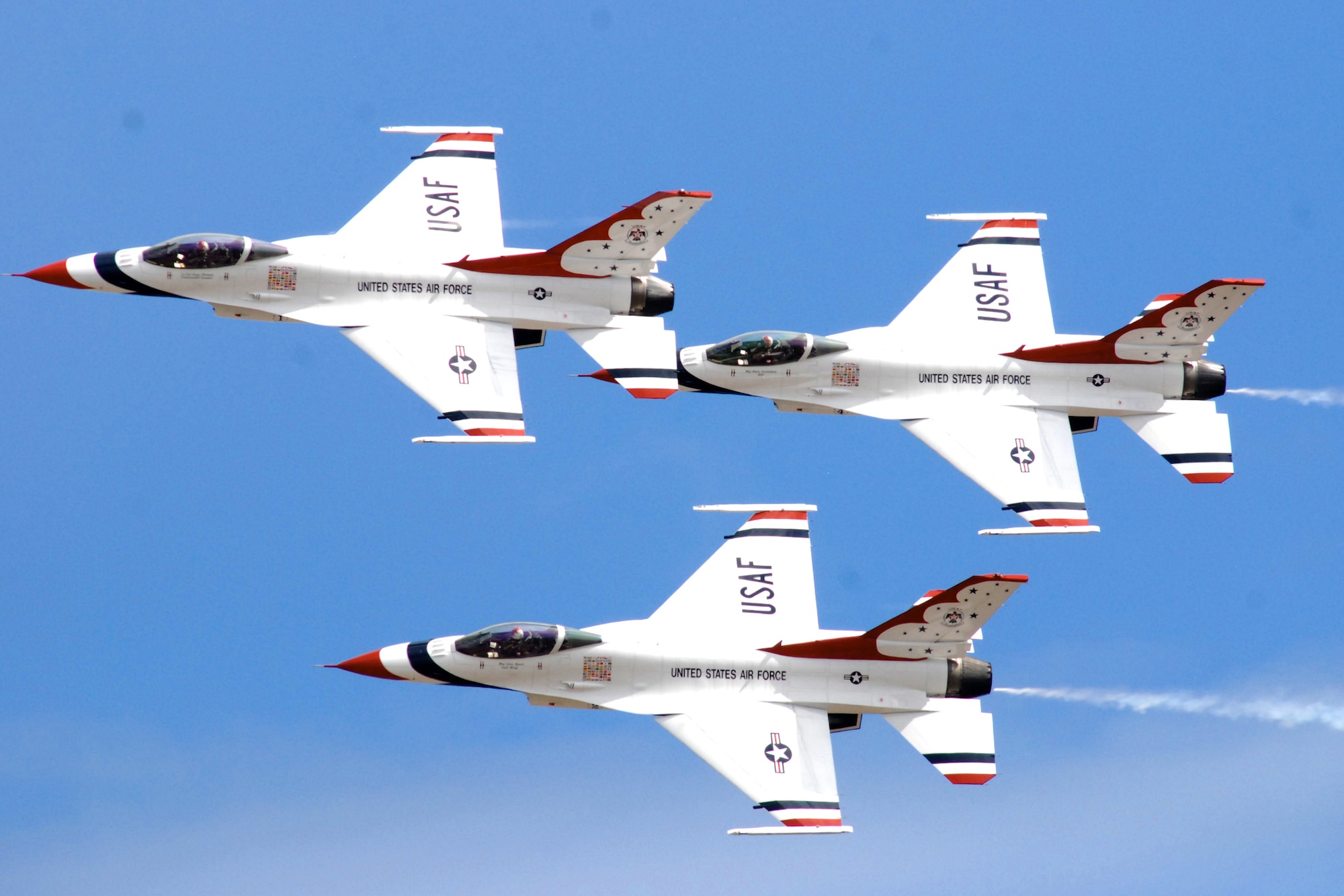 The U.S. Air Force Demonstration Squadron Thunderbirds practice their performance over Hickam Air Force Base, Hawaii, for the "Wings Over the Pacific" open house Sept. 18, 2009. The Thunderbirds demonstrate the capabilities of the F-16 Fighting Falcon by performing combat maneuvers during their aerial demonstration. (U.S. Air Force photo/Staff Sgt. Mike Meares)