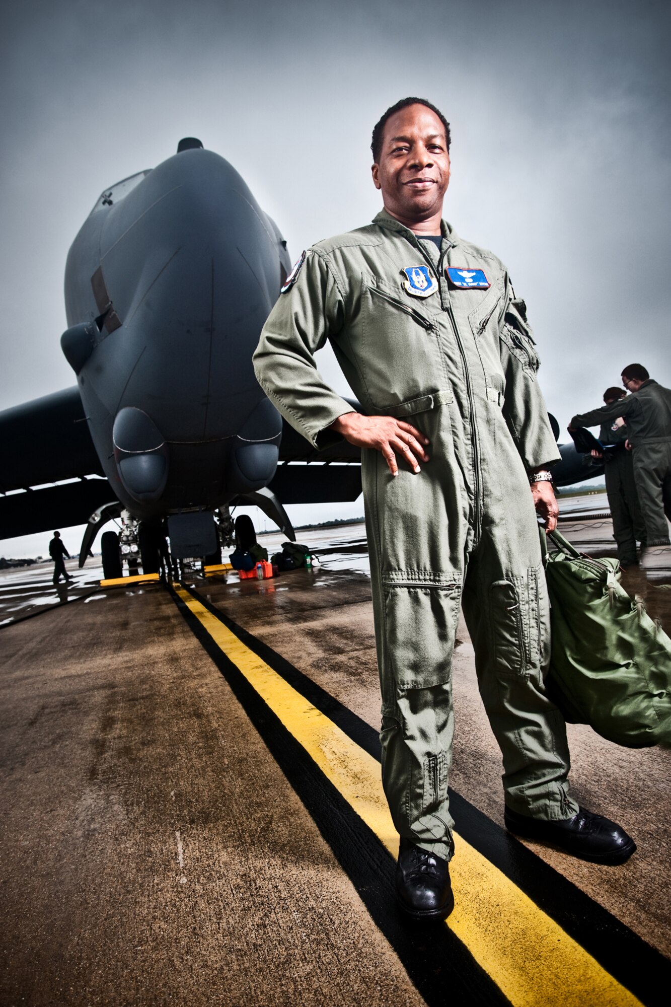 Lt. Col. Chris Myers, 93rd Bomb Squadron, instructor electronics warfare officer, strikes a pose for photographer Jason Flowers during a photo shoot at Barksdale Air Force Base, La., September 18, 2009. The photos will be used in a brochure for Texas A&M University-Commerce titled "To All Who Have Served in the Armed Services...Thank You." A&M-Commerce is a designated "Military Friendly" university and the brochure will help the university highlight recent veterans and active duty personnel who represent the student body and faculty. Colonel Myers is also known as Dr. Myers on the A&M-Commerce campus. Mr. Flowers is a photographer for the Marketing and Communications department at Texas A&M University-Commerce. (Courtesy photo by Jason Flowers)