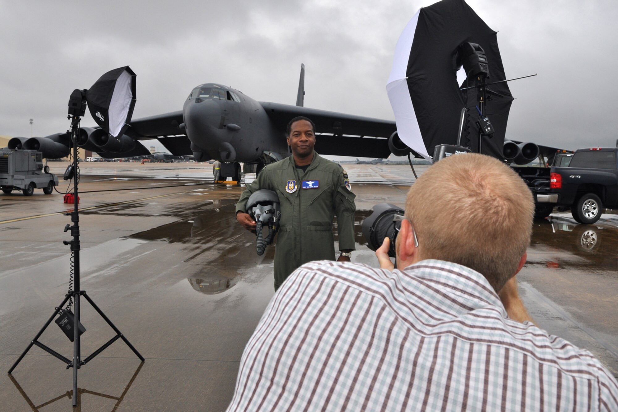 Lt. Col. Chris Myers, 93rd Bomb Squadron, instructor electronics warfare officer, strikes a pose for photographer Jason Flowers during a photo shoot at Barksdale Air Force Base, La., September 18, 2009. The photos will be used in a brochure for Texas A&M University-Commerce titled "To All Who Have Served in the Armed Services...Thank You." A&M-Commerce is a designated "Military Friendly" university and the brochure will help the university highlight recent veterans and active duty personnel who represent the student body and faculty. Colonel Myers is also known as Dr. Myers on the A&M-Commerce campus. (U.S. Air Force photo/Tech. Sgt. Jeff Walston)