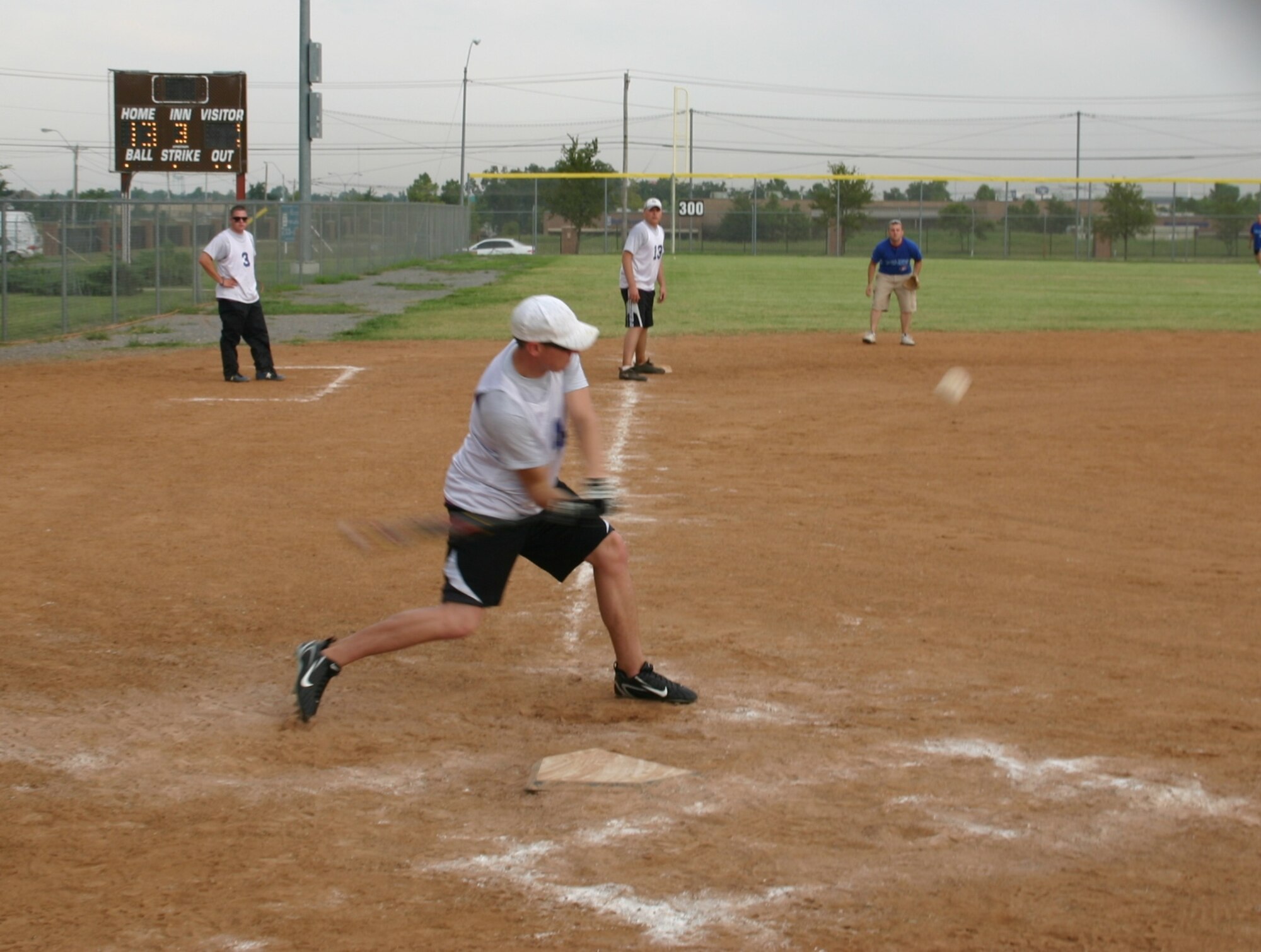 The American and Canadian teams competed in an American favorite, softball on September 9. Despite the Canadian team's valiant effort, the American team won the game, 27 to 8. Photo courtesy of Mr. Kenneth LaFayette.