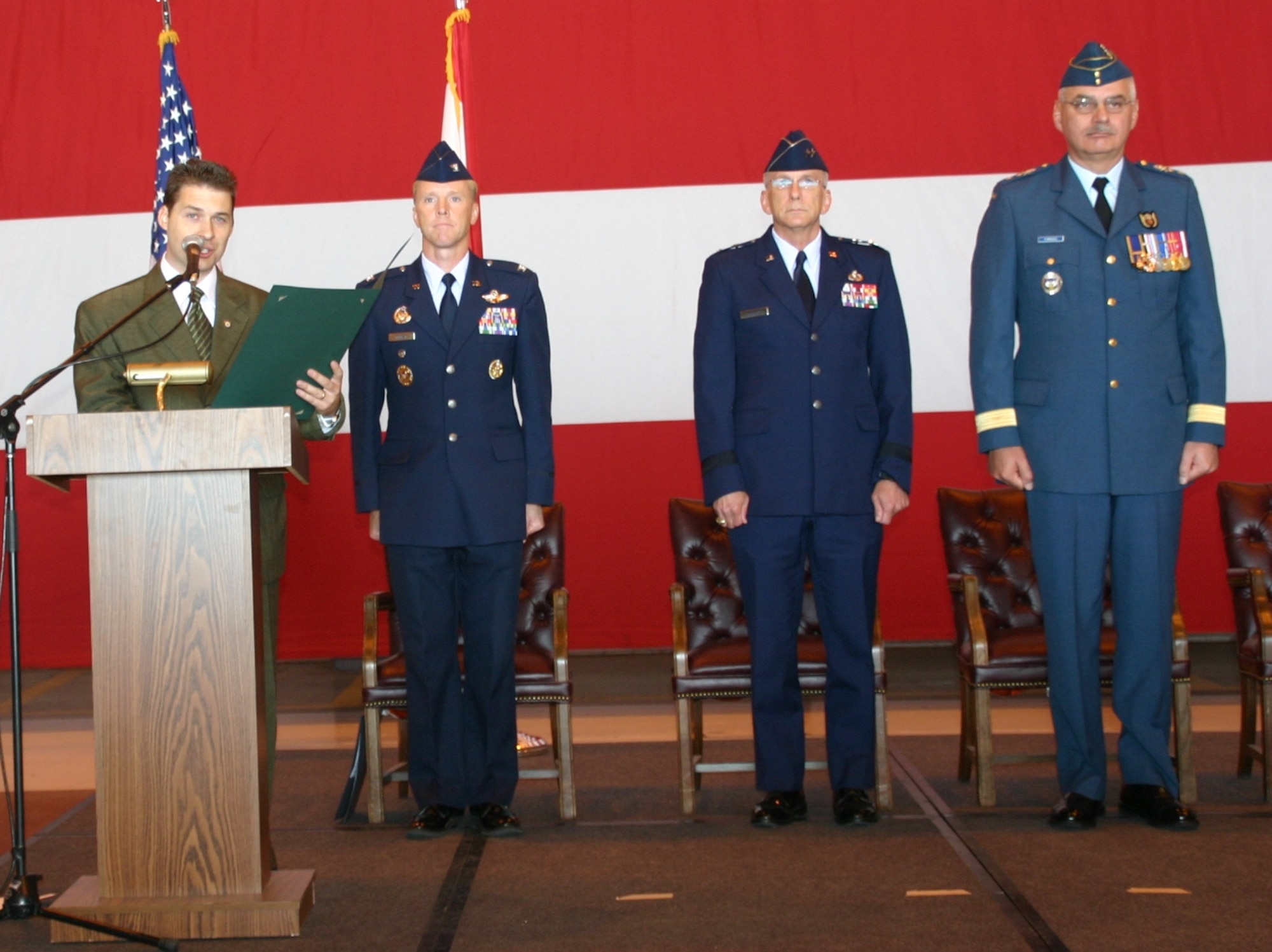 Representative Shane Jett reads the 30th Anniversary Canadian-American Partnership Proclamation during an official ceremony September 23. To his side are Col. Scott Forest, vice commander, 552 ACW, Maj. Gen. David Gillett, commander, OC-ALC, and Maj. Gen. Pierre Forgues, NORAD J3, Canadian Forces. Photo courtesy of 1st Lt. Kinder Blacke.