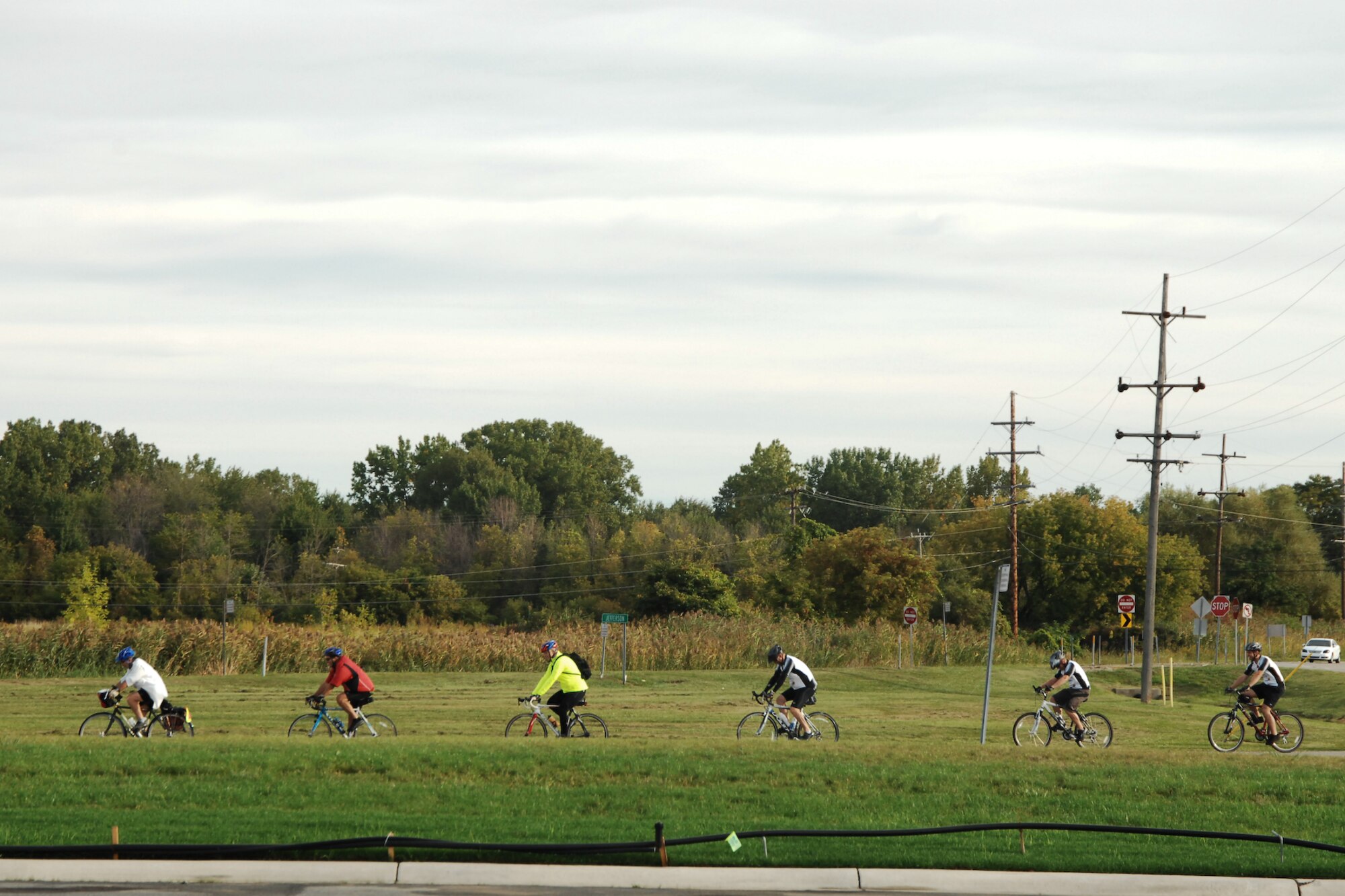 Members of the Corporal Christopher Kelly Willis Foundation (CCKWF) pull out from the Selfridge Air National Guard Base, Michigan, visitors center parking lot to begin their first leg of a four day biker charity ride. Thirteen bikers ranging from first time long-range riders to experienced riders, one of whom competed in an Iron Man competition for bike riding, are taking part in the ride raising money for scholarships for children of deceased or severely injured war veterans.  (USAF photo by SrA. Jeremy Brownfield) 