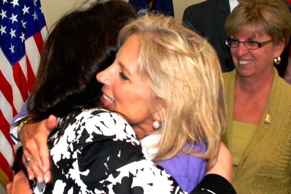 Dr. Jill Biden, wife of Vice President Joe Biden, hugs Theresa Martel, whose husband, Army 1st Sgt. Joseph Martel, is deployed with the New York National Guard's 206th Military Police Company in Basra, Iraq, as Susan Taluto, wife of Army Maj. Gen. Joseph J. Taluto, the New York National Guard adjutant general, looks on in Latham, N.Y., Sept. 21, 2009. (U.S. Army photo/Lt. Col. Paul Fanning) 