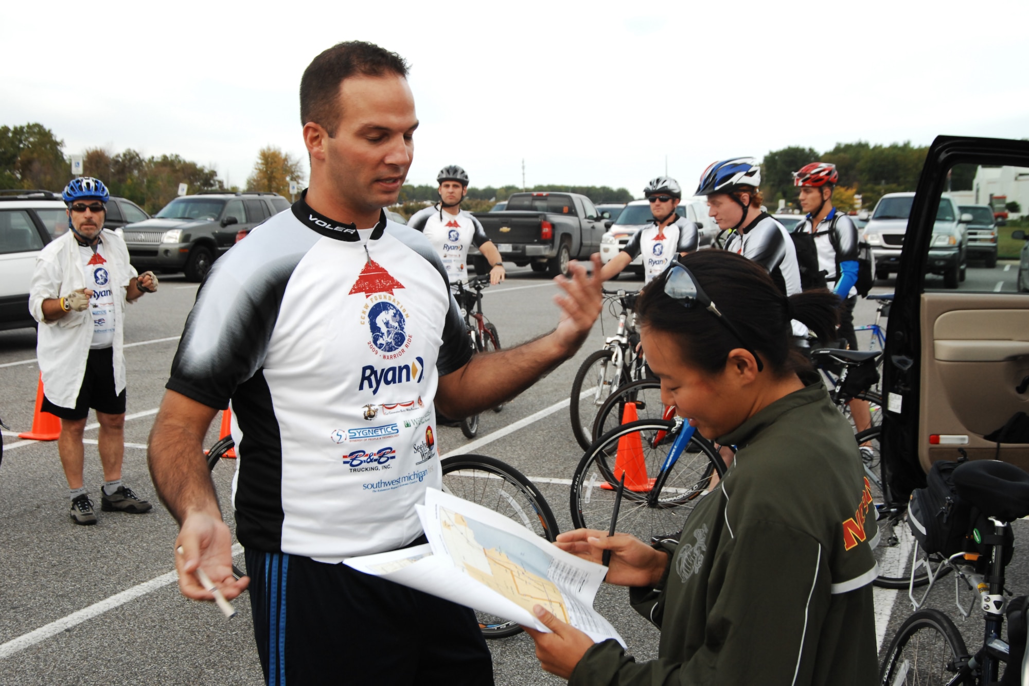 Bikers from the Corporal Christopher Kelly Willis Foundation (CCKWF), a charitable non-profit organization, gear up to begin their 2009 Warrior Ride, a charity ride across Michigan beginning at the Selfridge Air National Guard Base, Michigan, visitors center parking lot on Sep 24. The CCKWF was started in 2005 to raise money for scholarships for children of severely disabled veterans or military members who have lost their lives in combat. Shortly before stepping off on the ride Ron Patti, center,  goes over the first break point with the safety driver as other members of his team stand ready to take off. (USAF photo by SrA. Jeremy Brownfield)