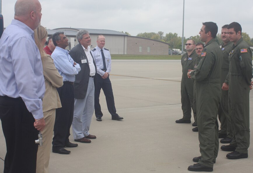 WRIGHT-PATTERSON AIR FORCE BASE, Ohio – Capt. Eric Palichat, 89th Airlift Squadron, explains the role of the C-5 Galaxy to civic leaders from Scott Air Force Base, Ill., during a tour as part of their one-day visit to 445th Airlift Wing Sept. 23.  Col. Roger Gallet, 445th Operations Group commander and Col. Brad Spacy, 88th Air Base Wing commander, welcomed and provided wing mission briefings to the group of 23 civic leaders and their military escorts from the 375th Airlift Wing and 932nd Airlift Wing.  The group also visited the 445th Aeromedical Evacuation Squadron and toured the National Museum of the United States Air Force. (U. S. Air Force photo/Stacy Vaughn)  