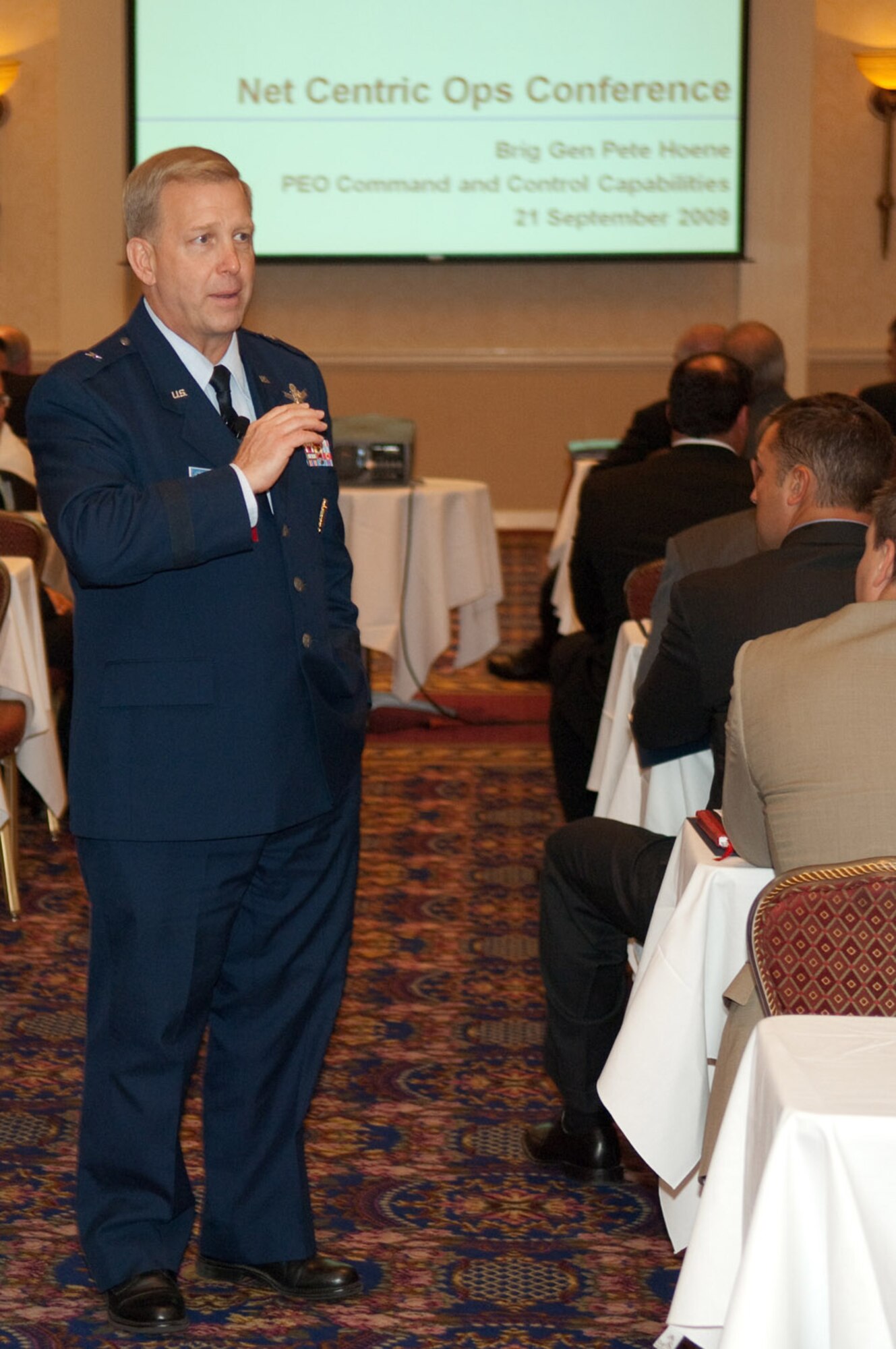 Brig. Gen. Pete Hoene, program executive officer for command and control capabilities at the Defense Information Systems Agency, shares his thoughts with audience members Sept. 21, 2009, during this year's Net-centric Operations Conference, held in New Castle, N.H..  (Air Force photo/Rick Berry)