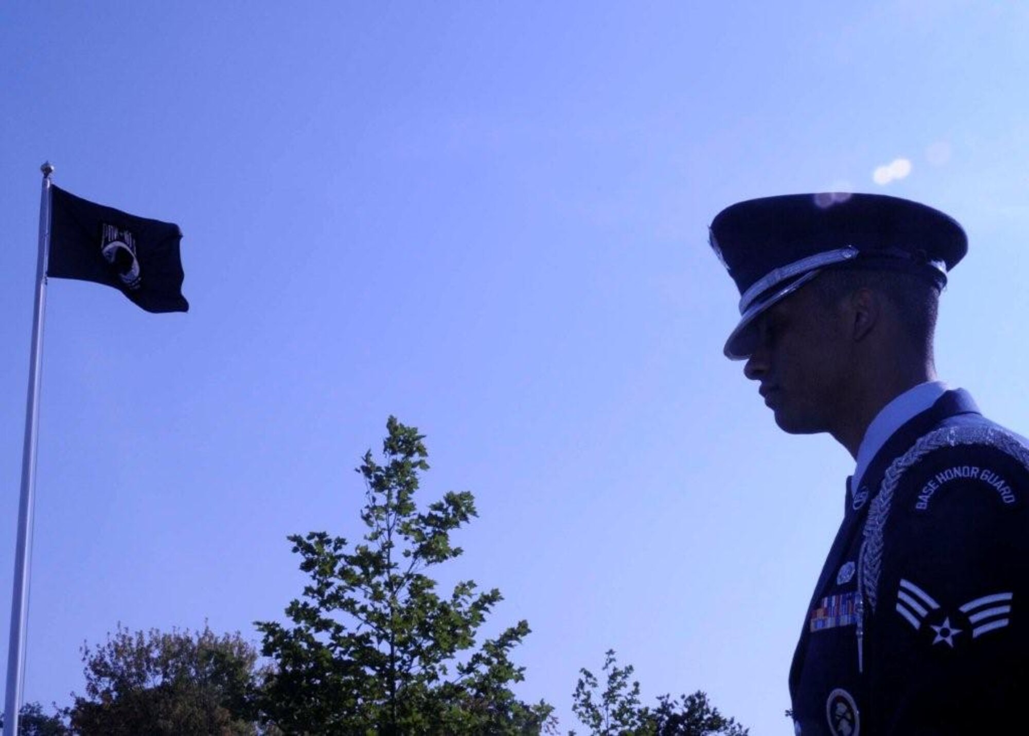 Senior Airman Marcello Robinson, 48th Fighter Wing Honor Guard member, stands at attention as he prepares to lay the POW/MIA wreath at the closing ceremony for the POW/MIA Remembrance Week, Sept.  18, 2009, at RAF Lakenheath, England.  (U.S. Air Force photo/Airman 1st Class Eboni Knox)