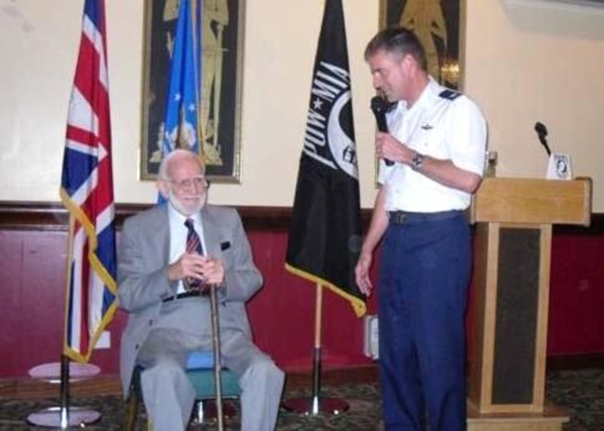 Col. Jay Silveria, 48th Fighter Wing commander, introduces Charles Waite, former prisoner of war, before Mr. Waite shares his experiences at the POW/MIA commencement breakfast, Sept. 14,  2009, RAF Lakenheath. Charles Waite was a British prisoner of war. (U.S. Air Force photo/Airman 1st Class Eboni Knox)