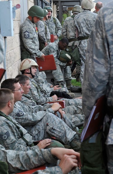 MOODY AIR FORCE BASE, Ga. -- Members from the 23rd Wing wait to process through the deployment control center processing line during the Phase I Operational Readiness Inspection here Sept. 21. The inspection will test how well the wing prepares for a short notice deployment tasking. (U.S. Air Force photo by Senior Airman Schelli Jones)