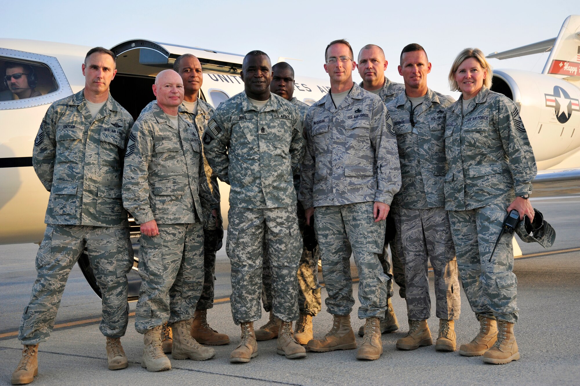 SOUTHWEST ASIA -Senior enlisted leaders of U.S. Central Command, Air Force Central Command and the 380th Air Expeditionary Wing, pause for a group photo prior to departing here Sept. 23, 2009. Command Sergeant Major Hill is the U.S. Central Command, senior enlisted leader. (U.S. Air Force photo/Tech. Sgt. Charles Larkin Sr)