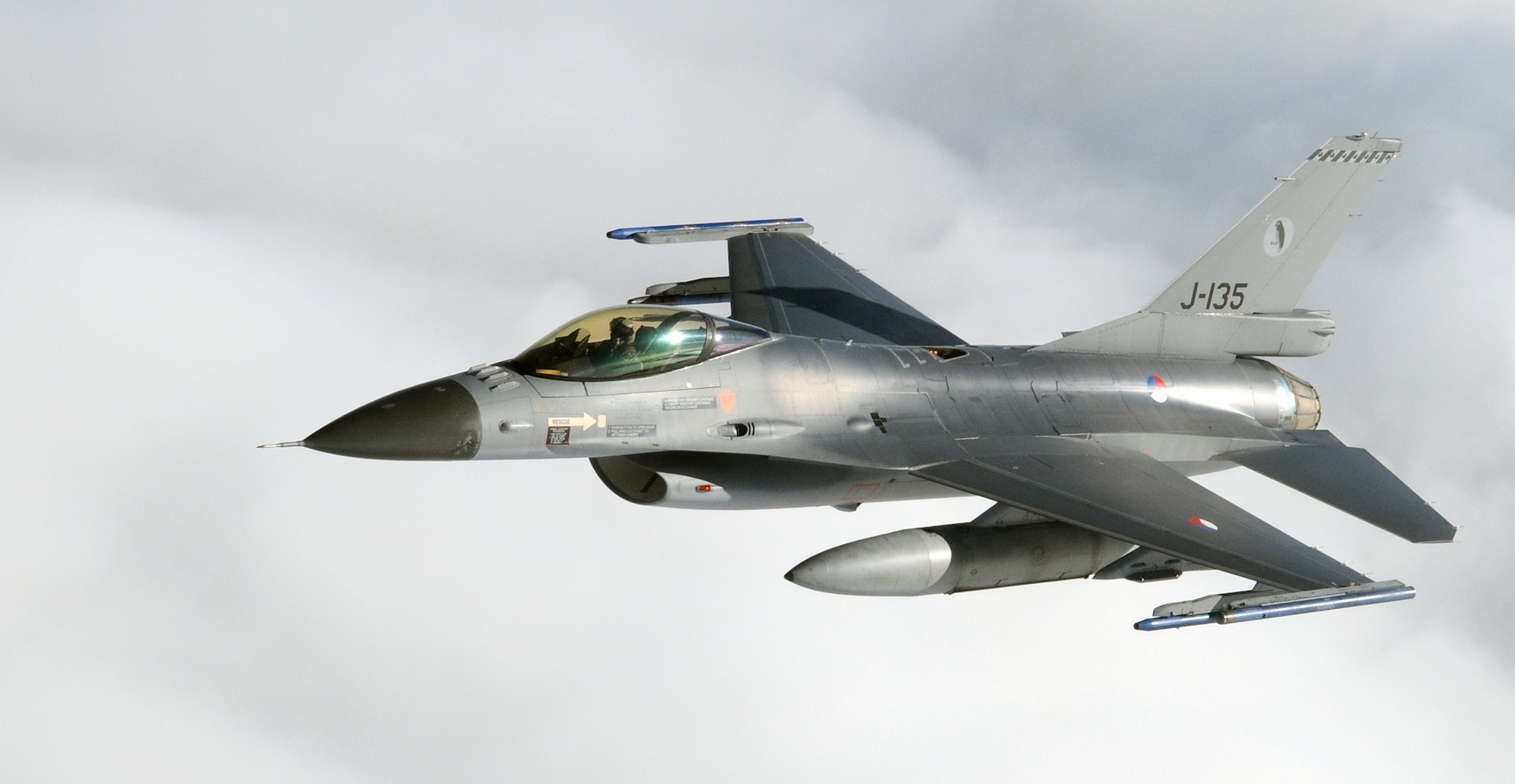RAF MILDENHALL, England -- A Royal Netherlands Air Force F-16 Fighting Falcon flies in support of Exercise Bold Avenger 2009 over the North Sea Sept. 23. The exercise was geared to train participating units in a realistic environment, to promote mutual understanding and cooperation, according to their official Web site, www.airramstein.nato.int/BAR09. Refueling support for the exercise was provide by RAF Mildenhall's 351st Air Refueling Squadron. (U.S. Air Force photo/Senior Airman Thomas Trower)