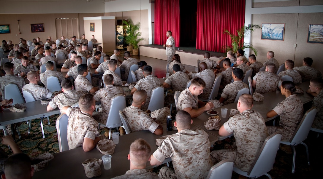 CAMP H.M. SMITH, Hawaii - More than 100 noncommisioned officers and junior enlisted from Headquarters and Service Battalion, U.S. Marine Corps Forces, Pacific, gathered at the Sunset Lanai, Sept. 25 for MarForPac Sgt. Maj. James R. Futrell's professional military education. The PME was the first time the recently appointed MarForPac sergeant major had the opportunity to sit down with Marines, talking about the Marine Corps current mission as well answering any questions. (Official U.S. Marine Corps photo by Cpl. Achilles Tsantarliotis)(Released)