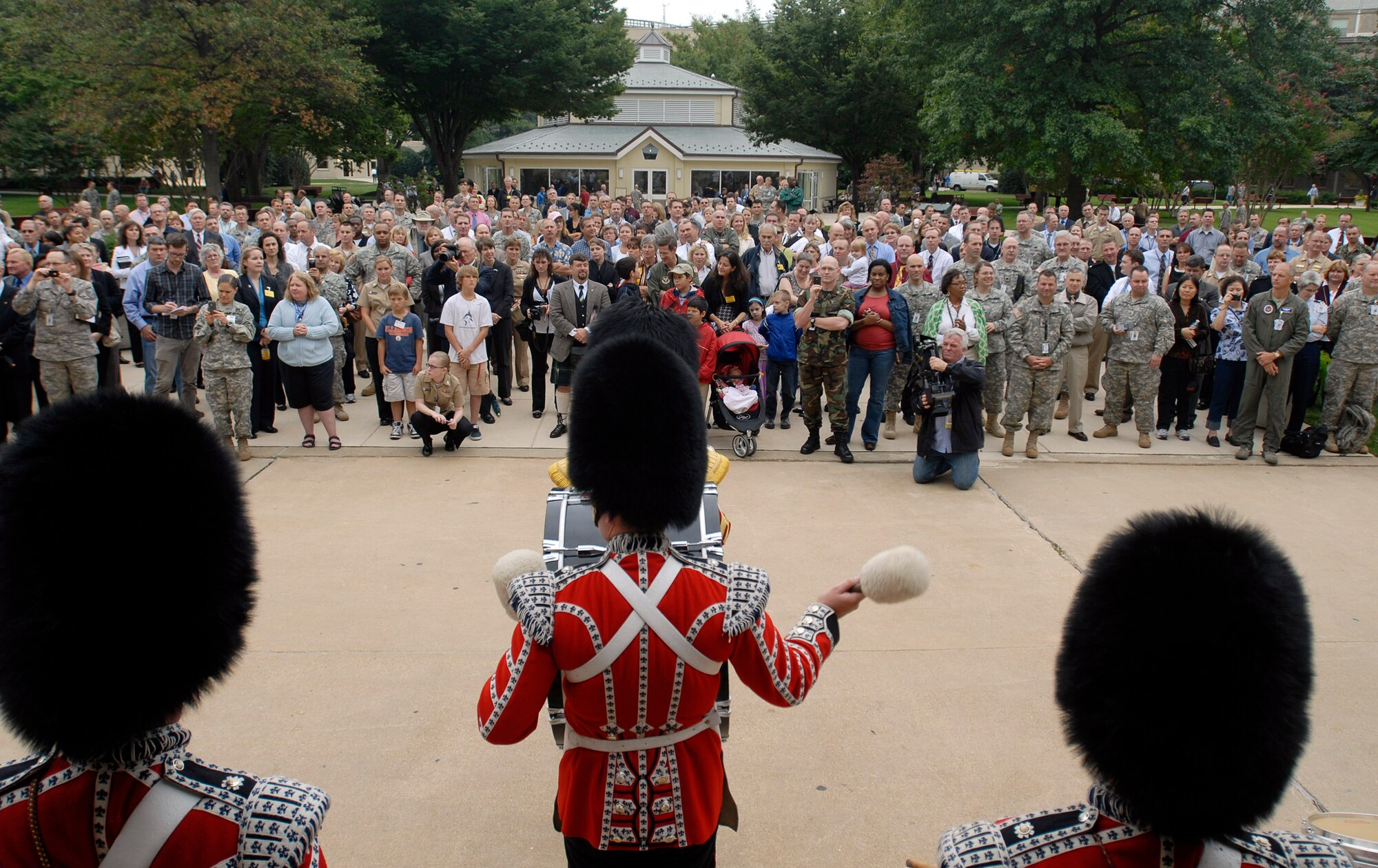 The British Army Pipes and Drums of the 1st Battalion Scots Guard performs for employees, servicemembers and families Sept. 25, 2009, at the Pentagon. The band that consists of infantry soldiers performed for its closet allies prior to a Helmand Province deployment next spring. (U.S. Air Force photo/Master Sgt. Stan Parker) 
