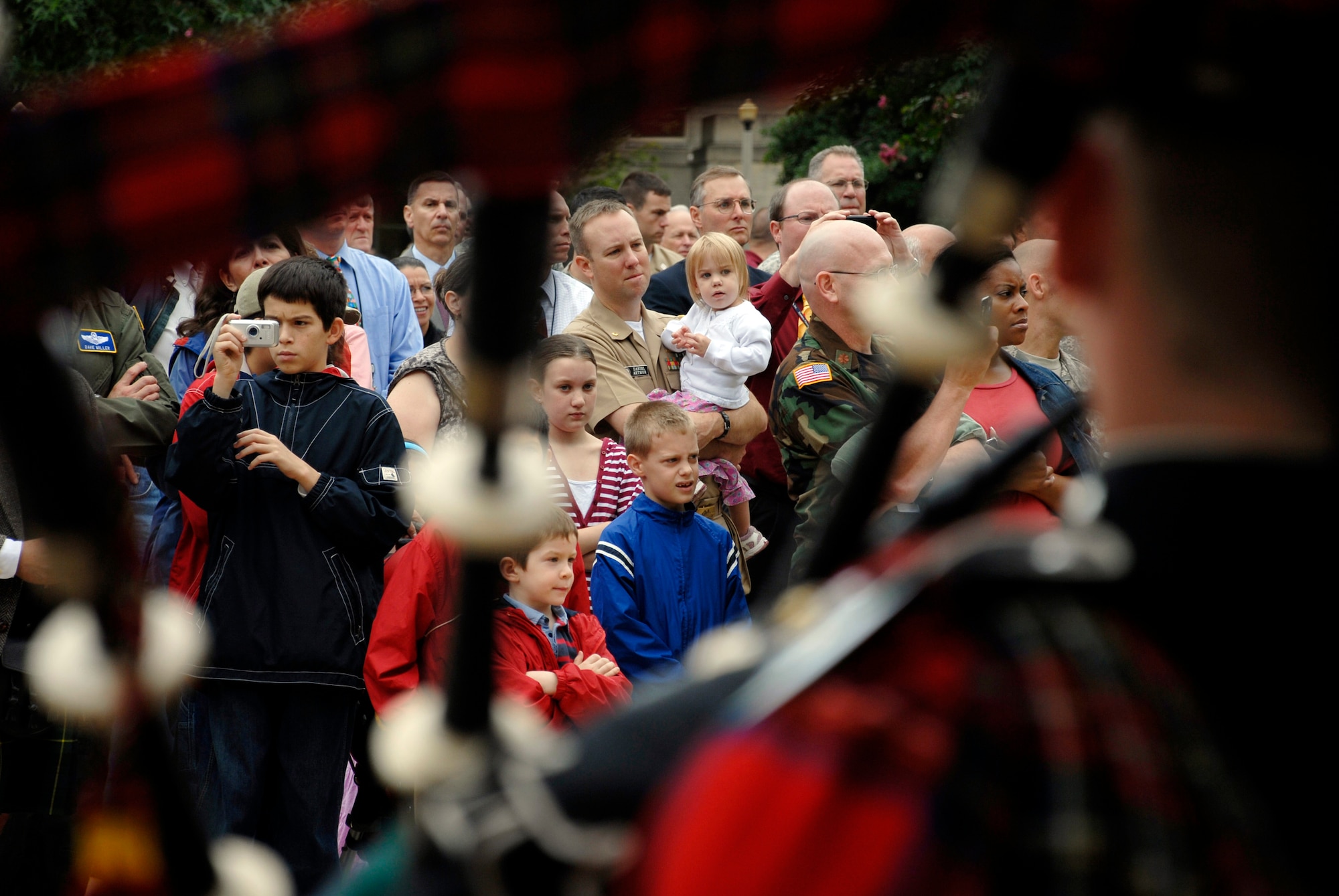 The British Army Pipes and Drums of the 1st Battalion Scots Guard performs for employees, servicemembers and families Sept. 25, 2009, at the Pentagon. The band that consists of infantry soldiers performed for its closet allies prior to a Helmand Province deployment next spring. (U.S. Air Force photo/Master Sgt. Stan Parker) 
