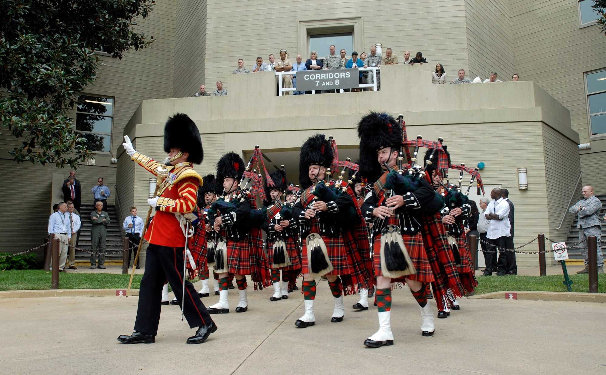 The British Army Pipes and Drums of the 1st Battalion Scots Guard performs for employees, servicemembers and families Sept. 25, 2009, at the Pentagon. The band that consists of infantry soldiers performed for its closet allies prior to a Helmand Province deployment next Spring. (U.S. Air Force photo/Master Sgt. Stan Parker) 