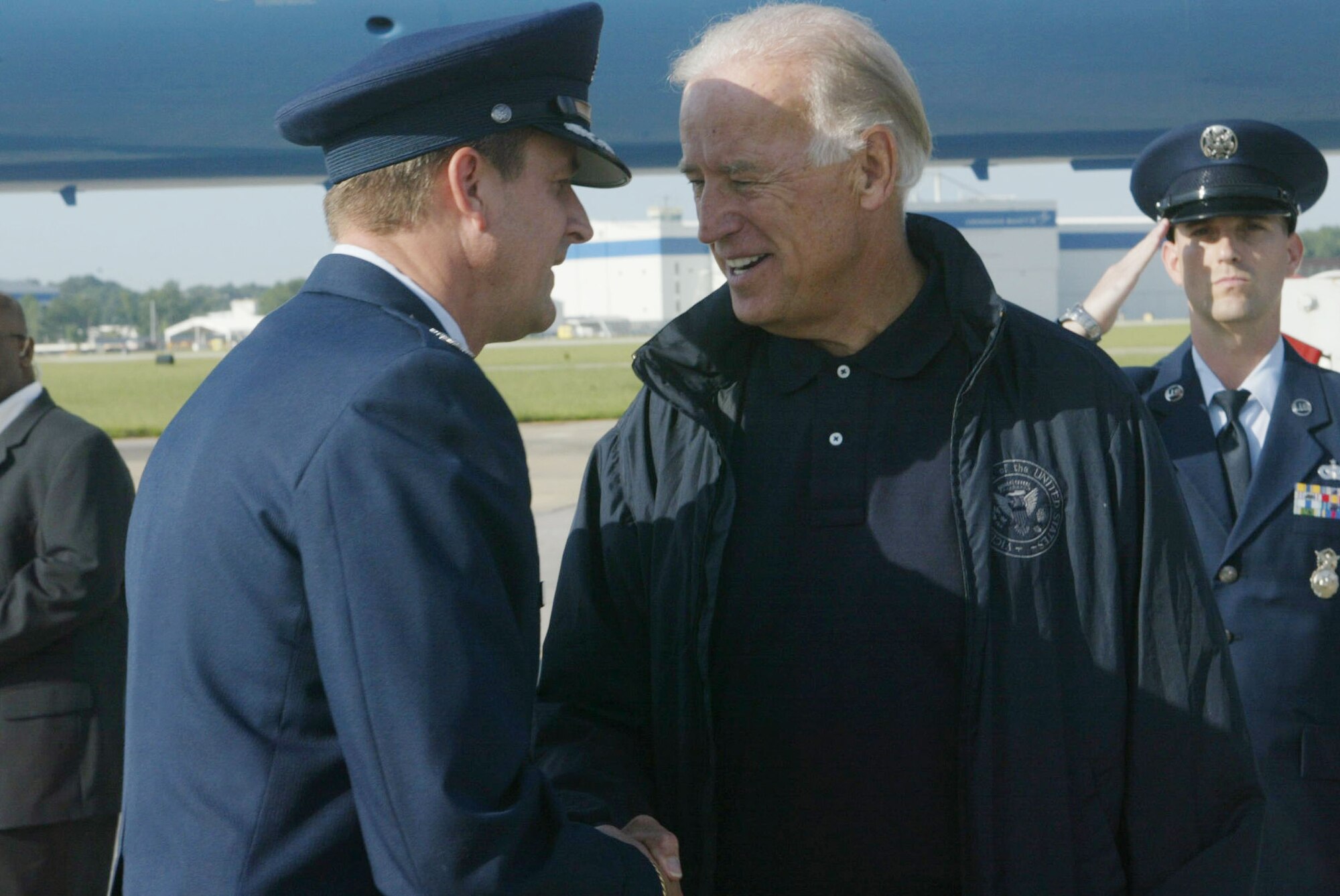 Col. Heath J. Nuckolls, 94th Airlift Wing commander welcomes Vice President Biden to Dobbins Air Reserve Base Sept. 25. Vice President Biden toured metro Atlanta by helicopter and saw portions of the city still underwater from flooding earlier this week. (U.S. Air Force photo/Don Peek)