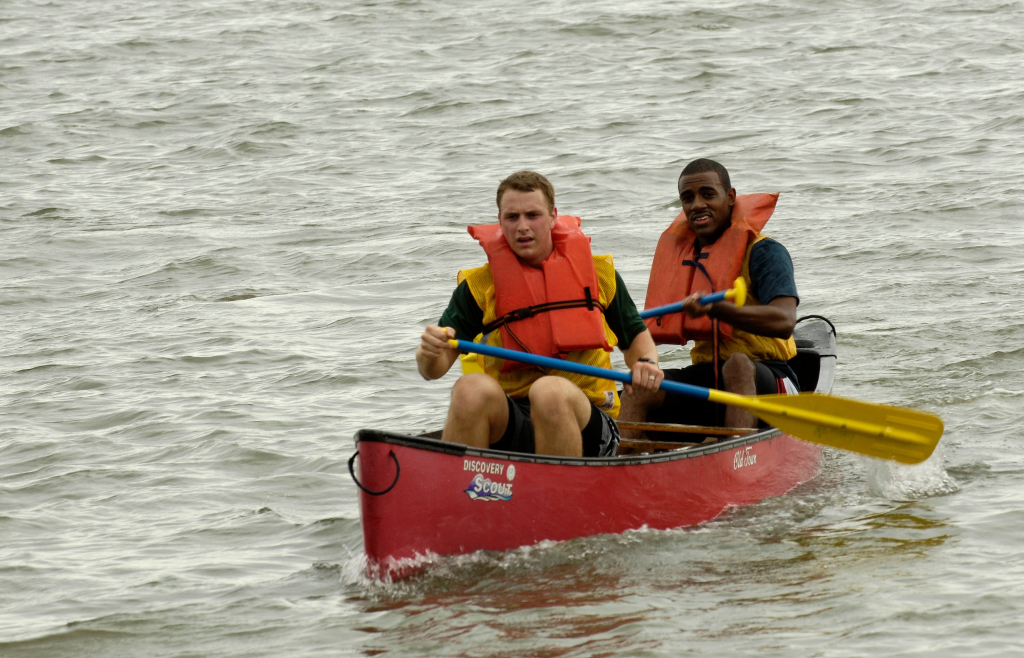 LANGLEY AIR FORCE BASE, Va. – Second Lts. Arrow Wyatt and David Pitts, 1st Communications Squadron, row their way to the finish line of a triathlon here Sept. 25.  This team finished the event with an amazing time of one hour, seven minutes and nine seconds. (U.S. Air Force Photo/Staff Sgt Christina M. Styer) 