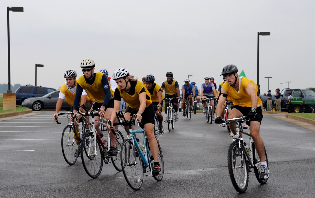 LANGLEY AIR FORCE BASE, Va. -- Members of Team Langley begin the cycling portion of a triathlon here Sept. 25. Approximately 21 teams signed up to battle it out over this 10K cycle, 5K run and 1.2K row.  (U.S. Air Force Photo/Senior Airman Dana Hill)