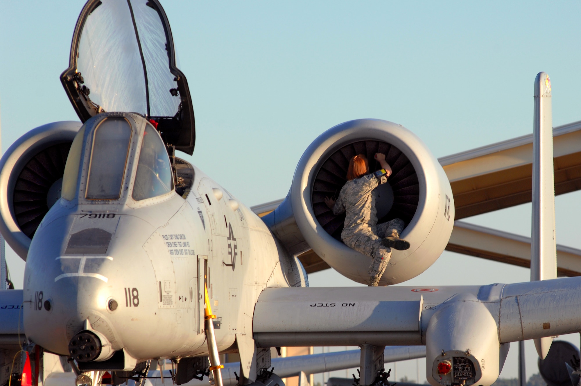WHITEMAN AIR FORCE BASE, Mo. - Airman Jill Hallandsworth, 442nd Fighter Wing crew chief, performs a pre flight engine check on an A-10 Thunderbolt II during an overall aircraft inspection, Sept. 25. Crew Chiefs with the 442nd FW maintain a vast fleet of 27 A-10 aircraft keeping each jet prepared for any mission at a moment's notice. (U.S. Air Force photo/Senior Airman Kenny Holston)  