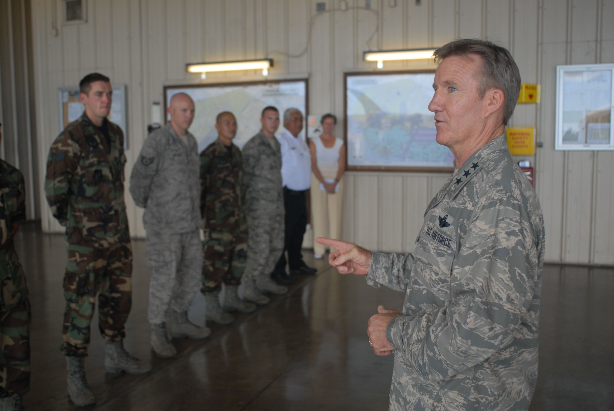 HICKAM AIR FORCE BASE, Hawaii -- Lt. Gen. "Hawk" Carlisle, 13th Air Force commander, speaks to 15th Civil Engineer Squadron firefighters during a tour of the 15th Airlift Wing here, Sept. 24. General Carlisle assumed command of the 13th Air Force on Sept. 2. (U.S. Air Force photo/Senior Airman Gustavo Gonzalez)