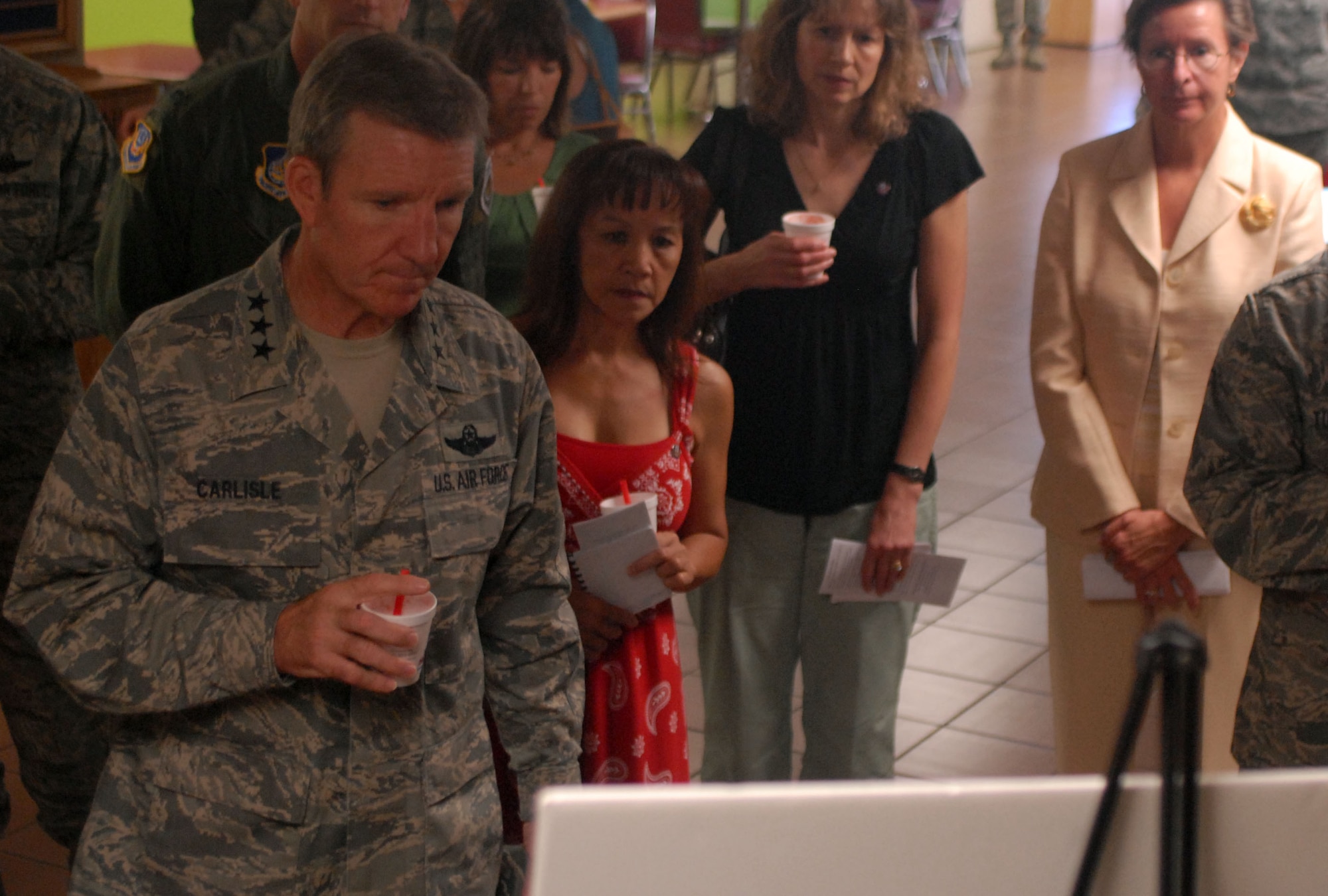 HICKAM AIR FORCE BASE, Hawaii -- Lt. Gen. "Hawk" Carlisle, 13th Air Force commander, is briefed on the future plans of the gymnasium during a tour of the 15th Airlift Wing here, Sept. 24. General Carlisle assumed command of the 13th Air Force on Sept. 2. (U.S. Air Force photo/Senior Airman Gustavo Gonzalez)