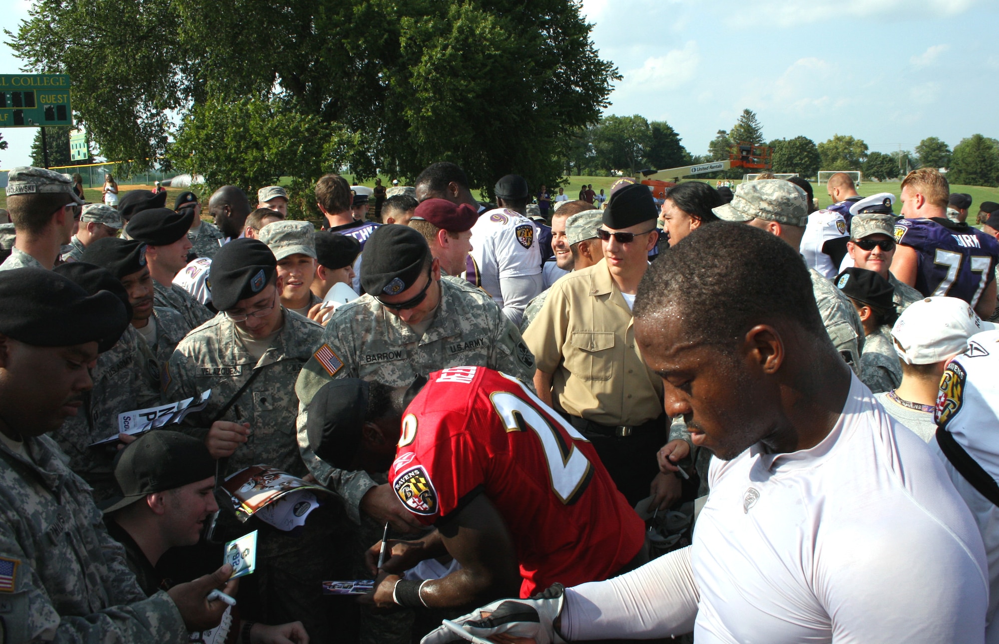 Baltimore Ravens safety, number 20, Ed Reed, and other players, signed autographs and expressed gratitude to the members of the military in attendance during the Military Appreciation Day at Mc Daniel College on August 19, 2009.  In attendance were members of each branch of service and some wounded warriors recovering from injuries received in combat. (U.S. Air Force photo by MSgt. Lou DeVeaux, 175th Wing Public Affairs, Warfield Air National Guard Base, Maryland, United States)   
