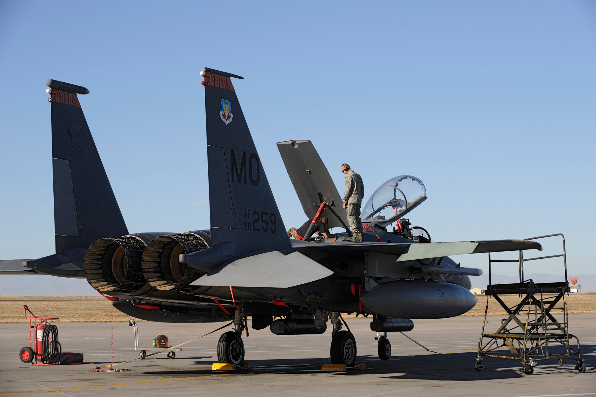 MOUNTAIN HOME AIR FORCE BASE, Idaho -- Staff Sgt. Robert Perry and Senior Airman Robert Eland, 366th Aircraft Maintenance Unit avionics specialists, perform maintenance on an F-15E Strike Eagle from the 391st Fighter Squadron during Gunfighter Flag Sept. 22. Gunfighter Flag, which ran from Sept. 14 through 24, was Mountain Home’s first ever large-scale, multi-national exercise which brought more than 450 personnel from the U.S. Air Force, U.S. Navy and Canadian air force to Mountain Home. (U.S. Air Force photo by Airman 1st Class Renishia Richardson)