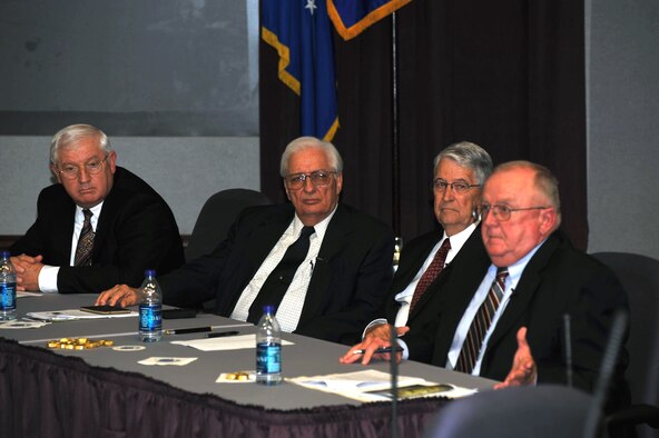 Retired Col. Gerald Flanagan (far right) talks about his experiences in air refueling during the Vietnam War as part of the Air Mobility Command Tanker "Living Legends" Speaker Series in the Global Reach Planning Center at Scott Air Force Base, Ill., on Sept. 24, 2009.  Colonel Flanagan was station at Kadena Air Base, Japan, during the Vietnam conflict as a tanker maintenance officer. He helped coordinate maintenance efforts for as many as 105 tankers that operated from Kadena for the Vietnam War.  (U.S. Air Force Photo/Tech. Sgt. Scott T. Sturkol)