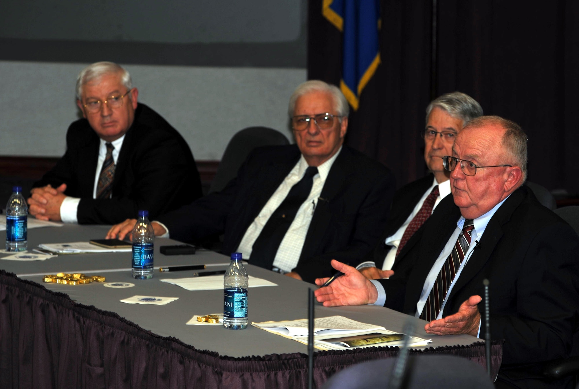 Retired Col. Gerald Flanagan (far right) talks about his experiences in air refueling during the Vietnam War as part of the Air Mobility Command Tanker "Living Legends" Speaker Series in the Global Reach Planning Center at Scott Air Force Base, Ill., on Sept. 24, 2009.  Colonel Flanagan was station at Kadena Air Base, Japan, during the Vietnam conflict as a tanker maintenance officer. He helped coordinate maintenance efforts for as many as 105 tankers that operated from Kadena for the Vietnam War.  (U.S. Air Force Photo/Tech. Sgt. Scott T. Sturkol)