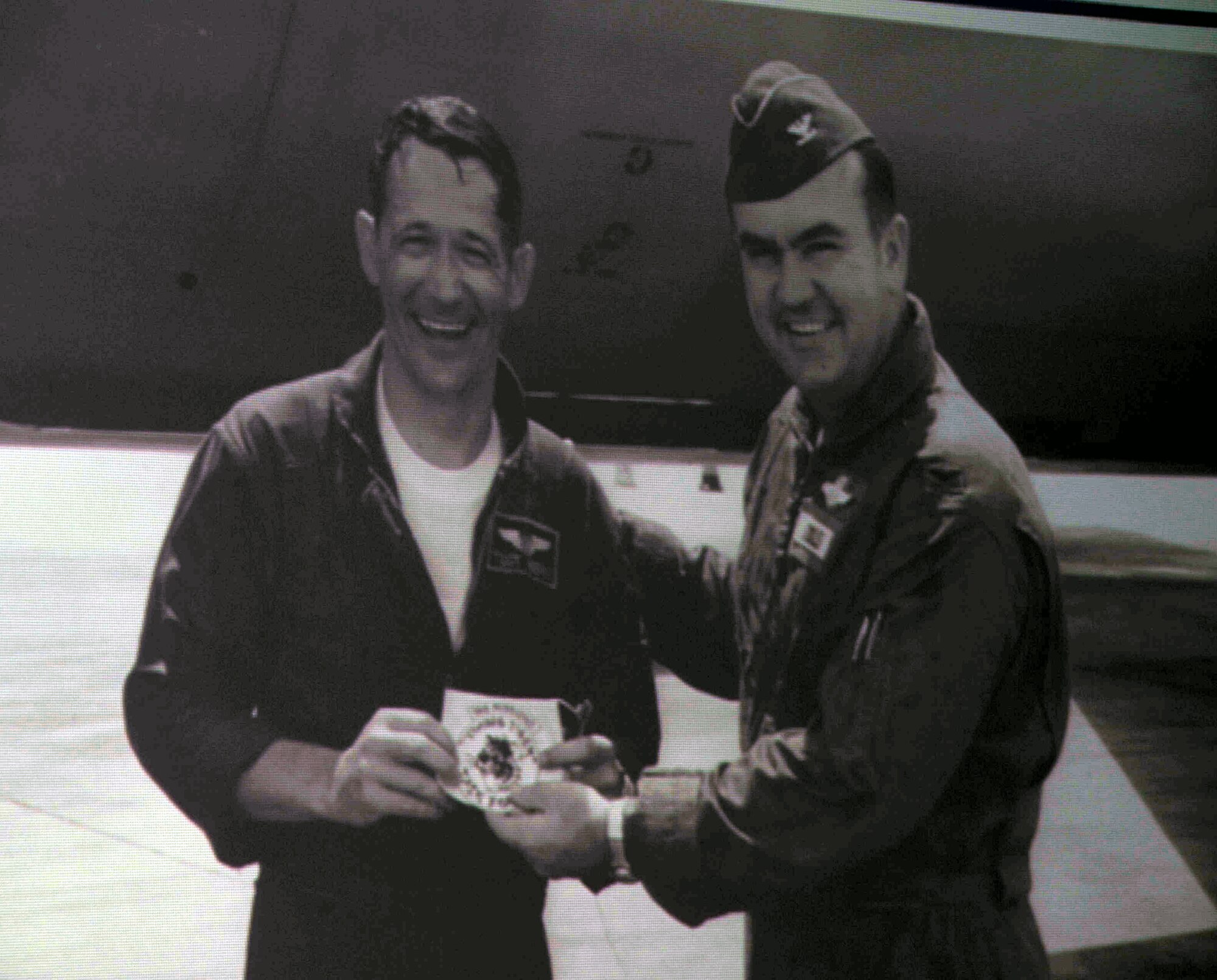 This photo shows retired Chief Master Sgt. John Akers (left) -- a former KC-135 boom operator -- while he was serving in support of the Vietnam War. Chief Akers shared his experiences in air refueling efforts for the war during a session of the Tanker "Living Legends" Speaker Series on Sept. 24, 2009, in the Global Reach Planning Center on Scott Air Force Base, Ill.  Major Burgett participated in three deployments to the Vietnam war zone. (U.S. Air Force Photo)