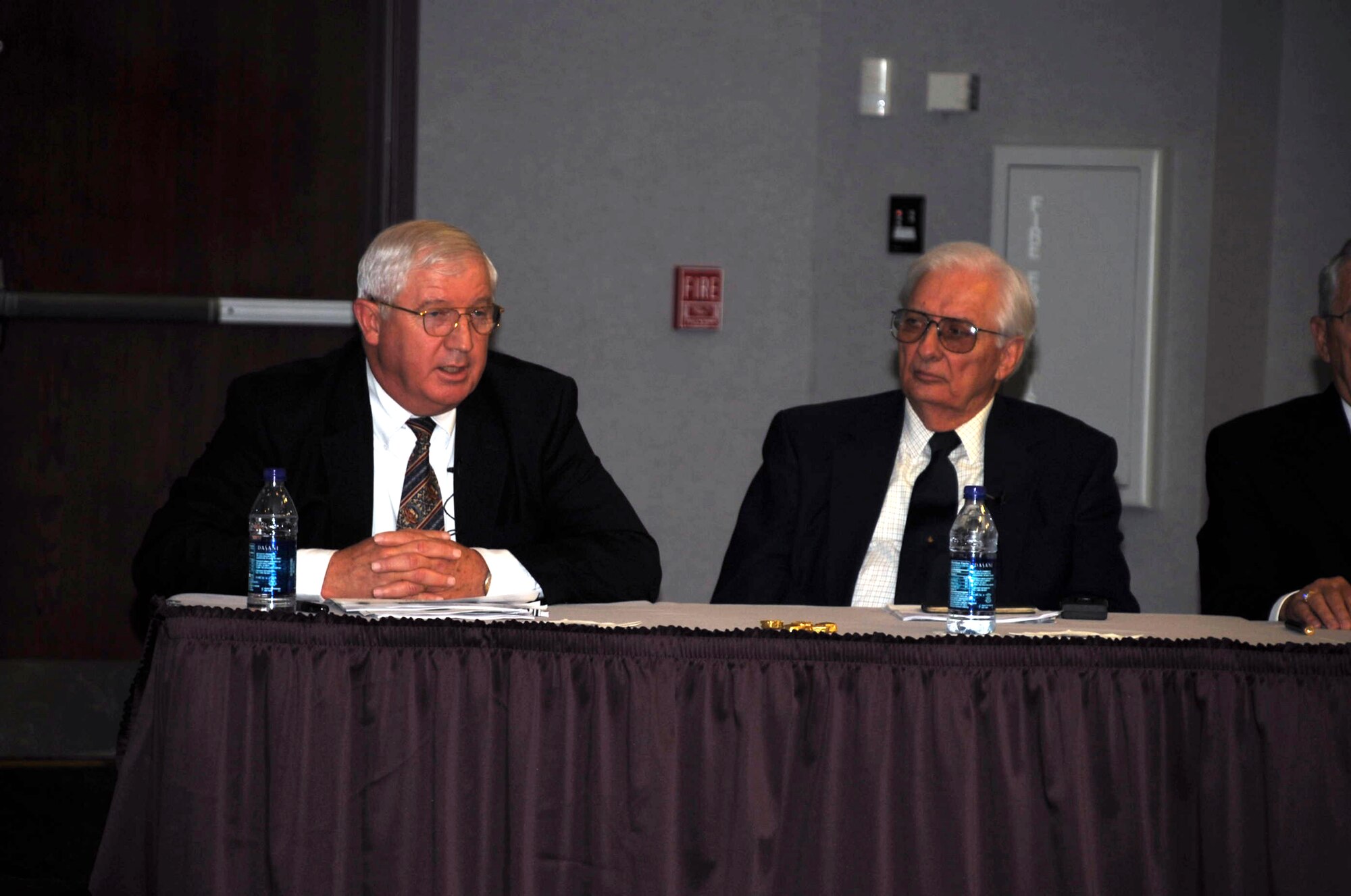 Retired Col. Bob Dawson (left) talks about his experiences as a tanker pilot during the Vietnam War as part of the Air Mobility Command Tanker "Living Legends" Speaker Series in the Global Reach Planning Center at Scott Air Force Base, Ill., on Sept. 24, 2009.  Also pictured is retired Maj. Donald Burgett -- a former KC-97 and KC-135 navigator who also served during the Vietnam War.  Colonel Dawson was involved in five back-to-back deployments to Southest Asia to support Operations Young Tiger and Arc Light between 1971 and 1973.  (U.S. Air Force Photo/Tech. Sgt. Scott T. Sturkol)